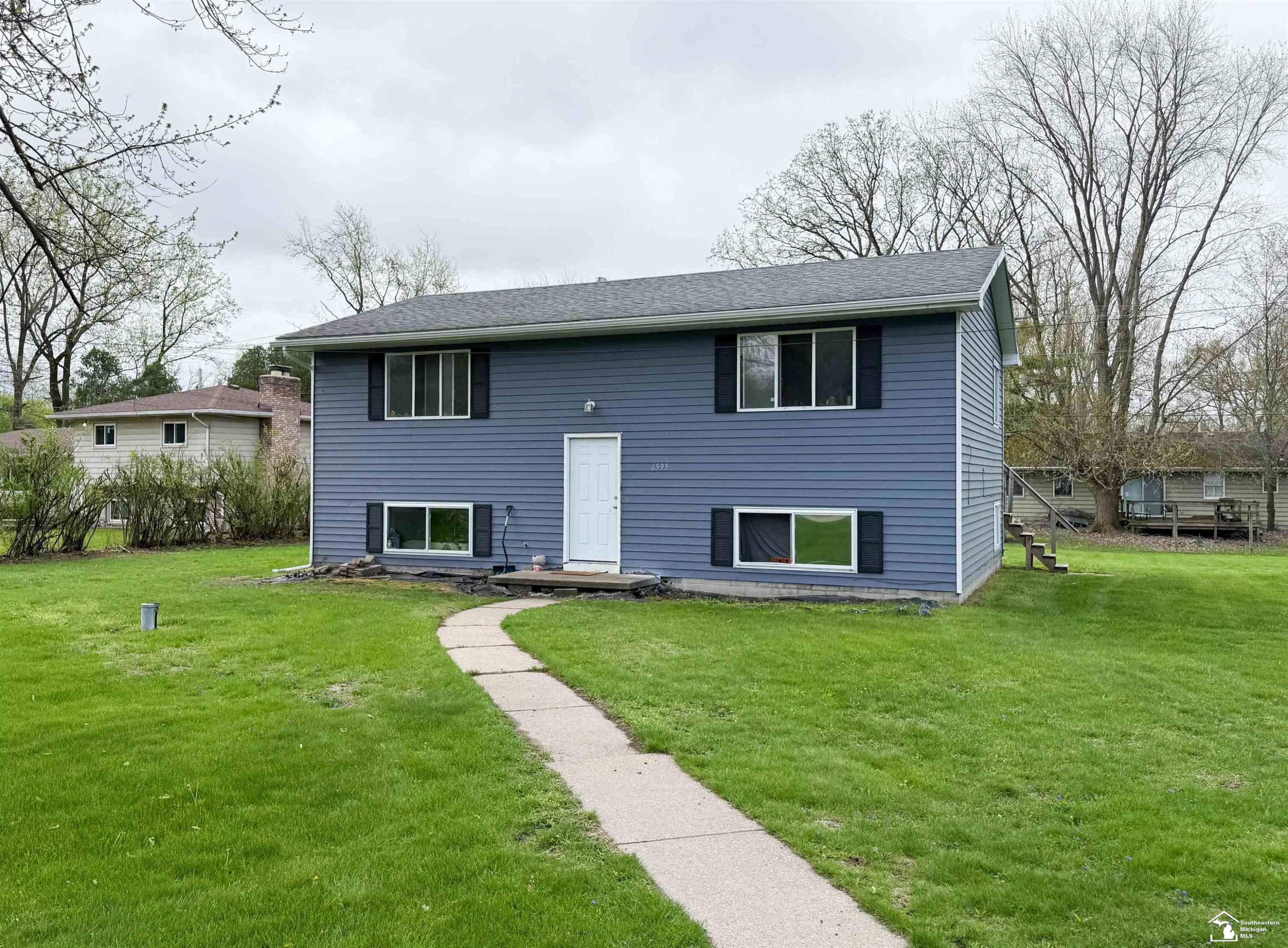 6595 Whiteford Center Road, Lambertville, MI 48144 — front exterior