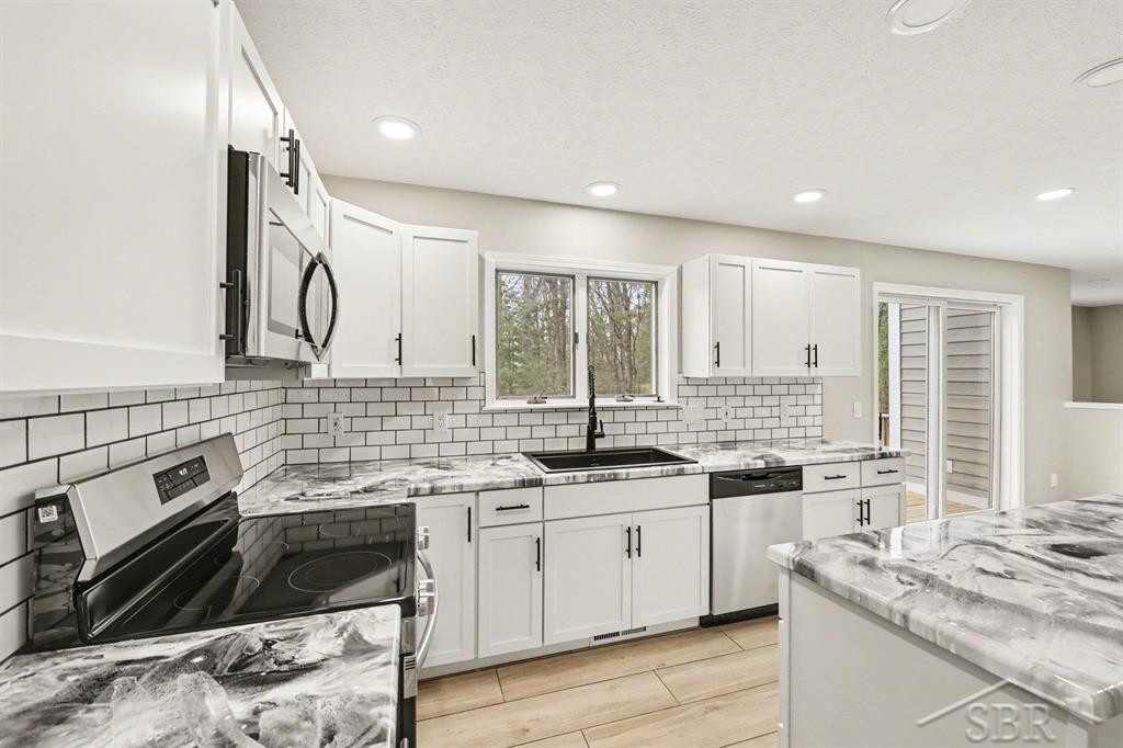 3854 Village Circle Drive, Traverse City, MI 49686 — Photo 16