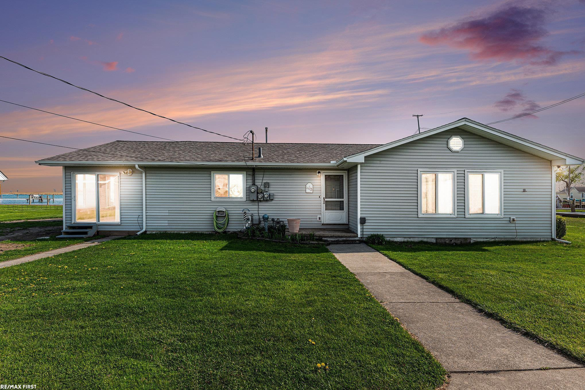7618 South Channel Drive, MI 48028 — Photo 2