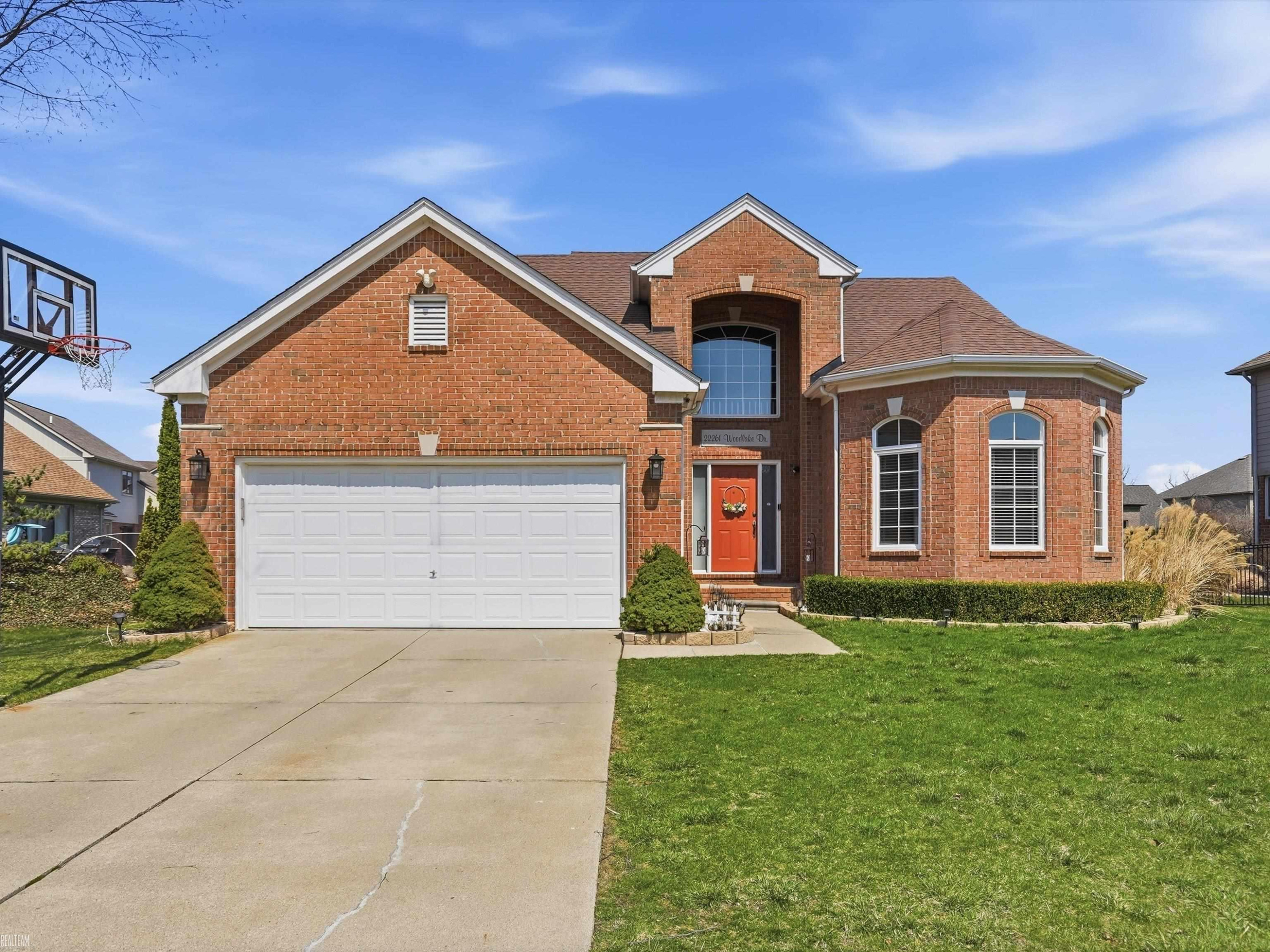 22261 Woodlake Drive, 143, MI 48044 — front exterior