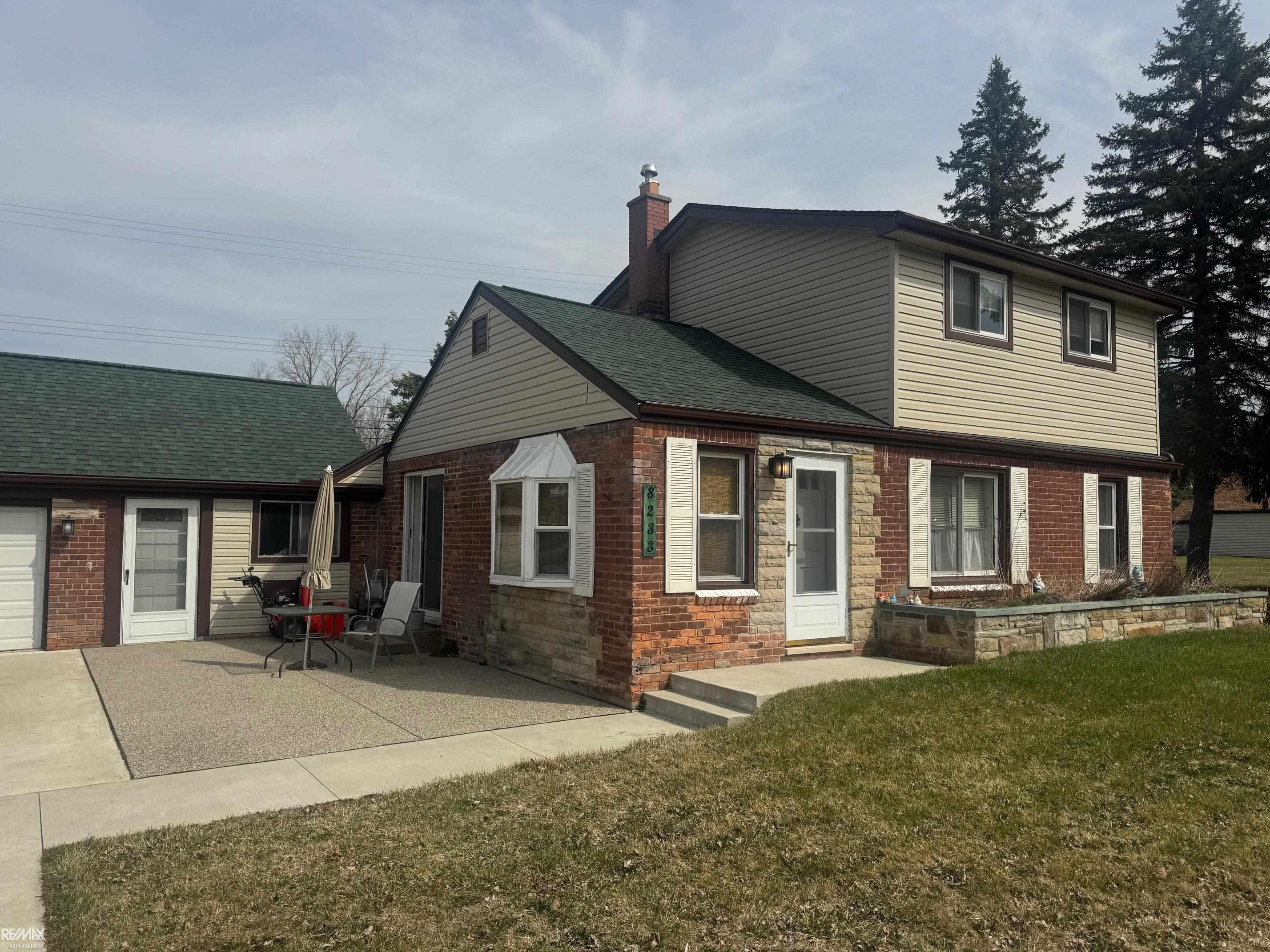 8233 Wilson Drive, Shelby Twp, MI 48316 — front exterior