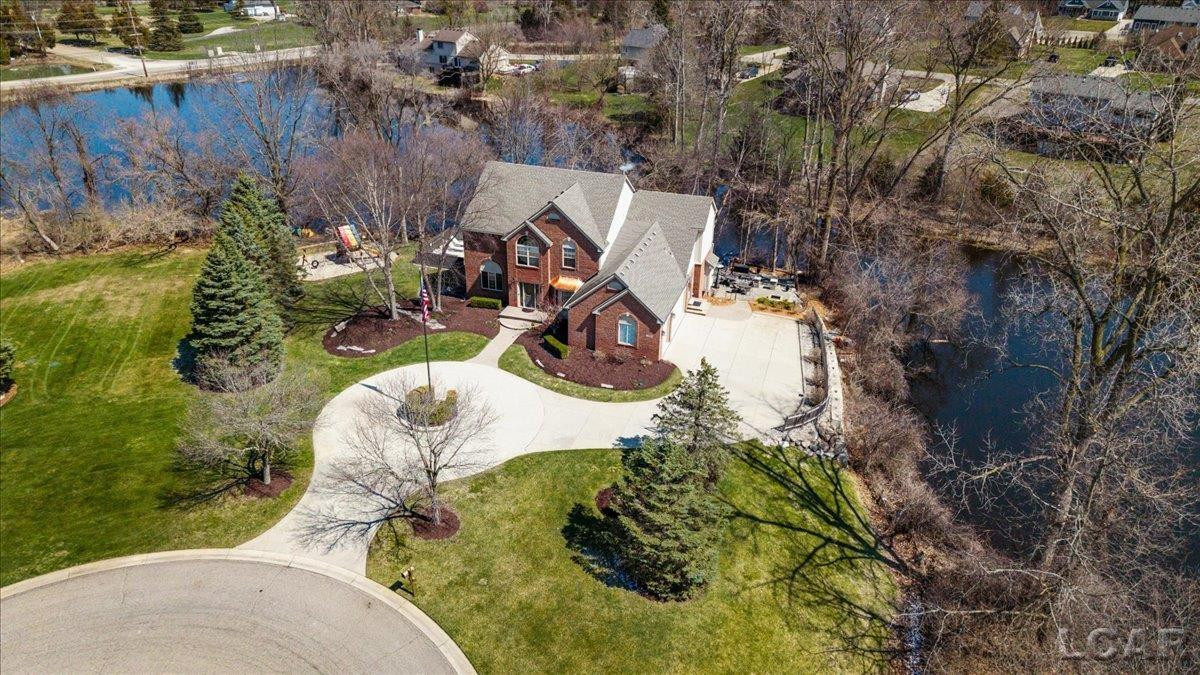 13000 Riviera Court, South Lyon, MI 48178 — front exterior