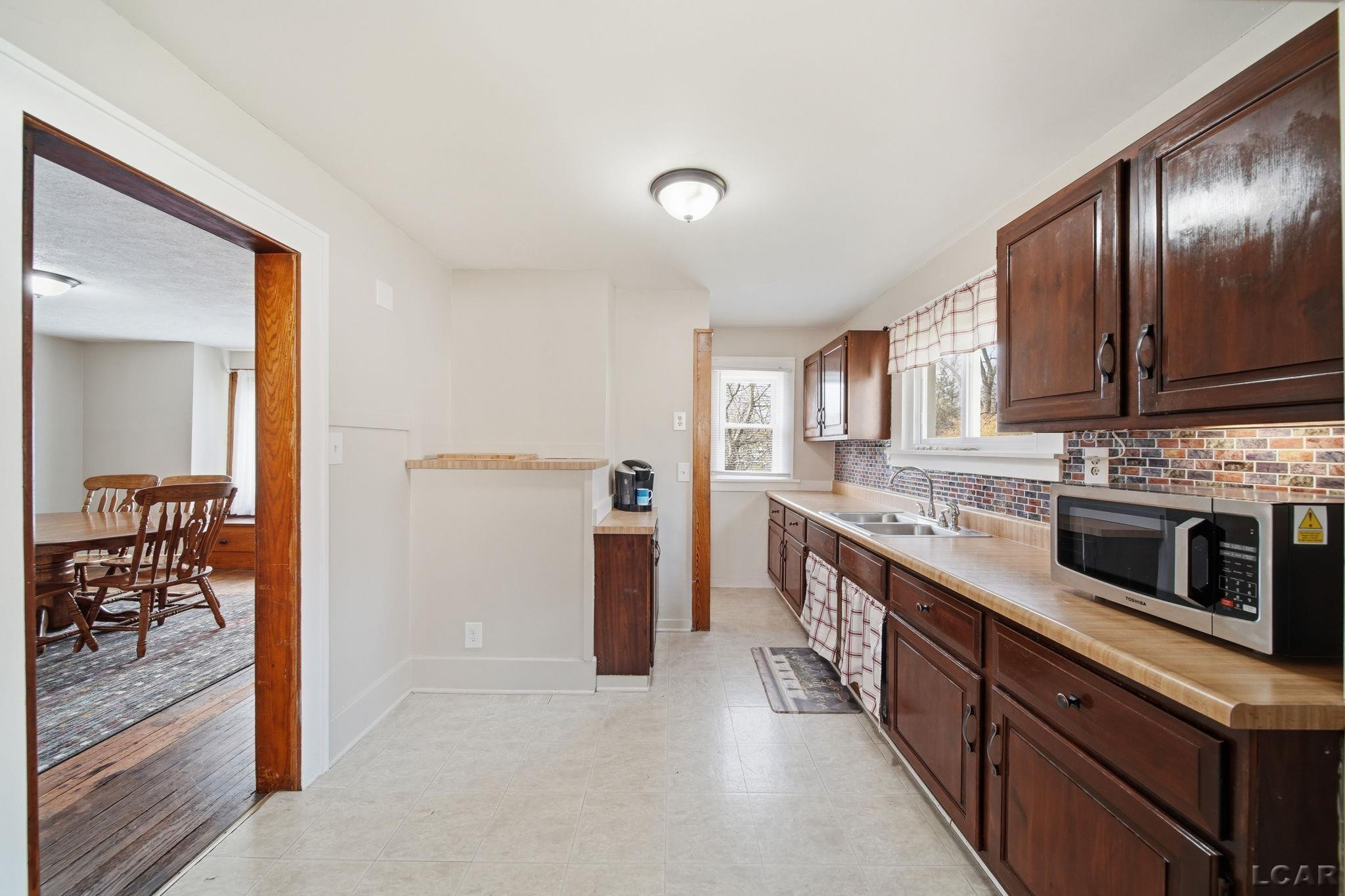 135 Greenly Street, Adrian, MI 49221 — Photo 18