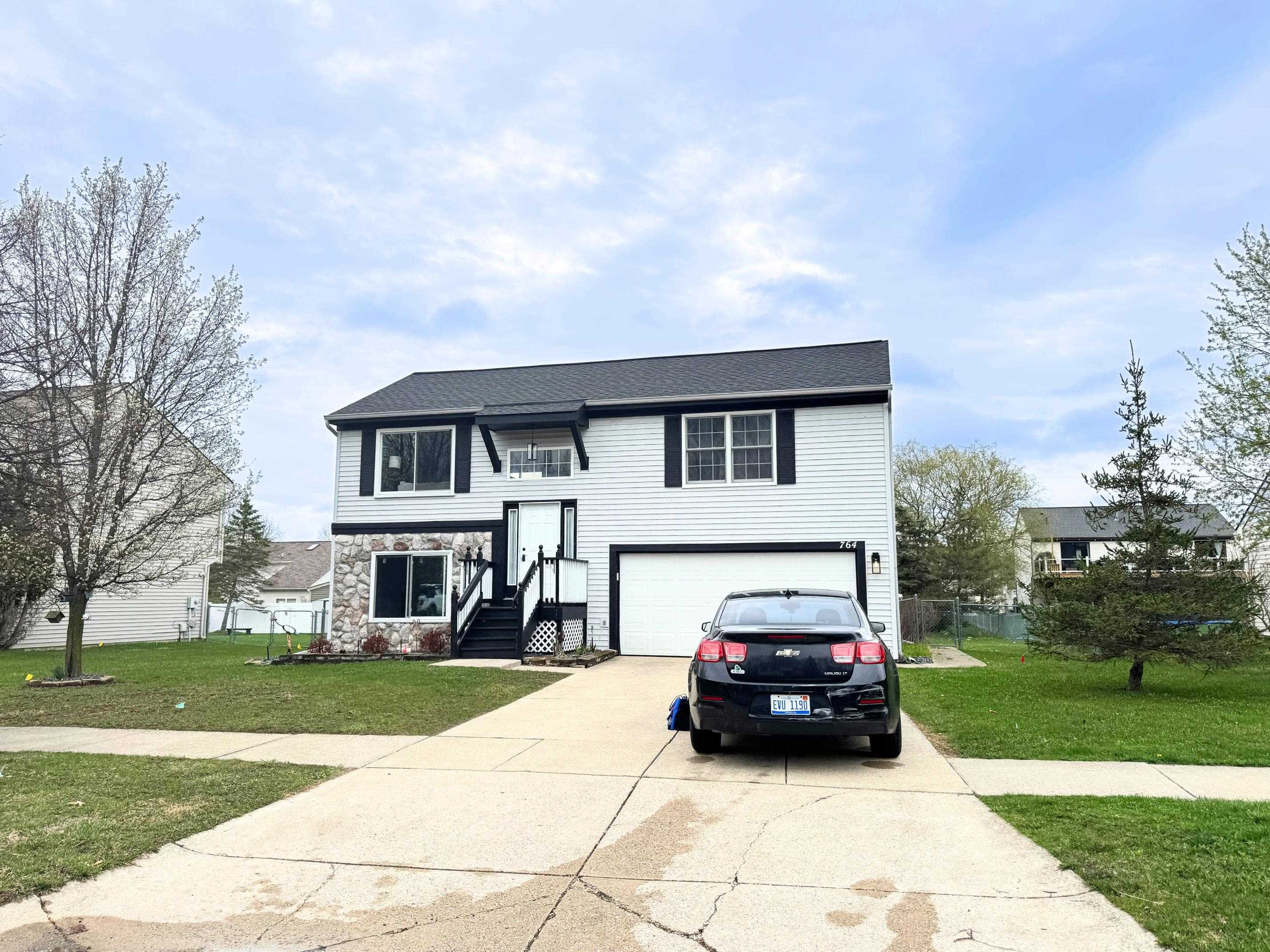 764 Carriage Hill Drive, Fenton, MI 48430 — front exterior
