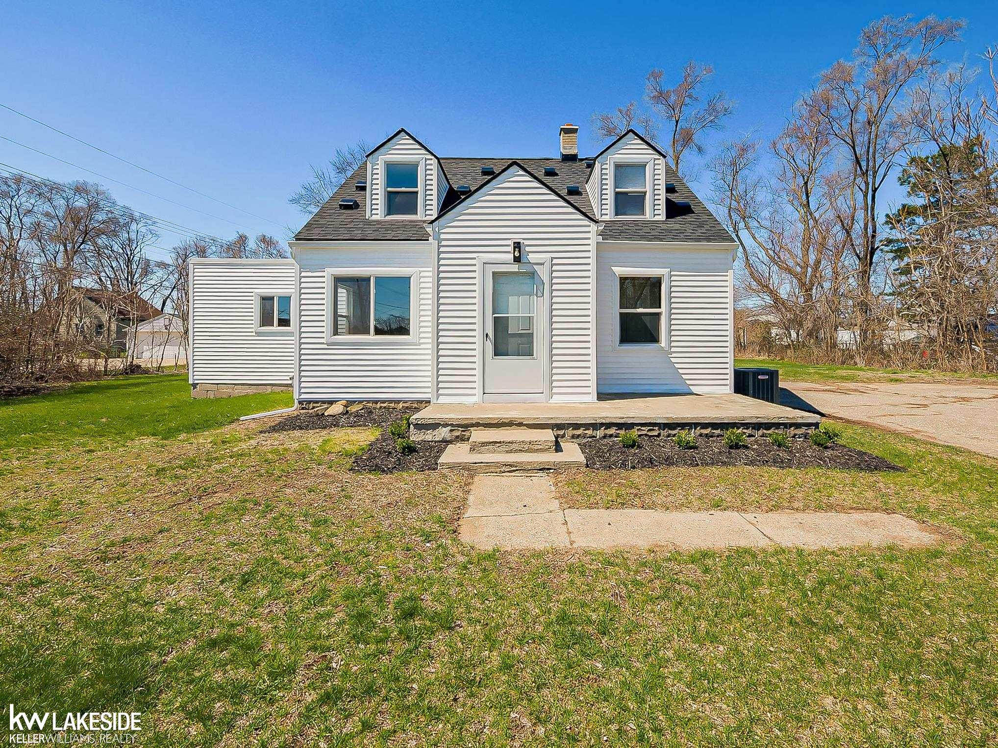 47051 Frederick Road, Shelby Twp, MI 48317 — front exterior