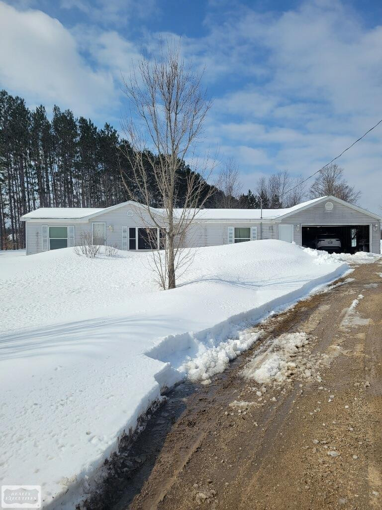 4843 Brockmeir Road, Rapid City, MI 49676 — front exterior