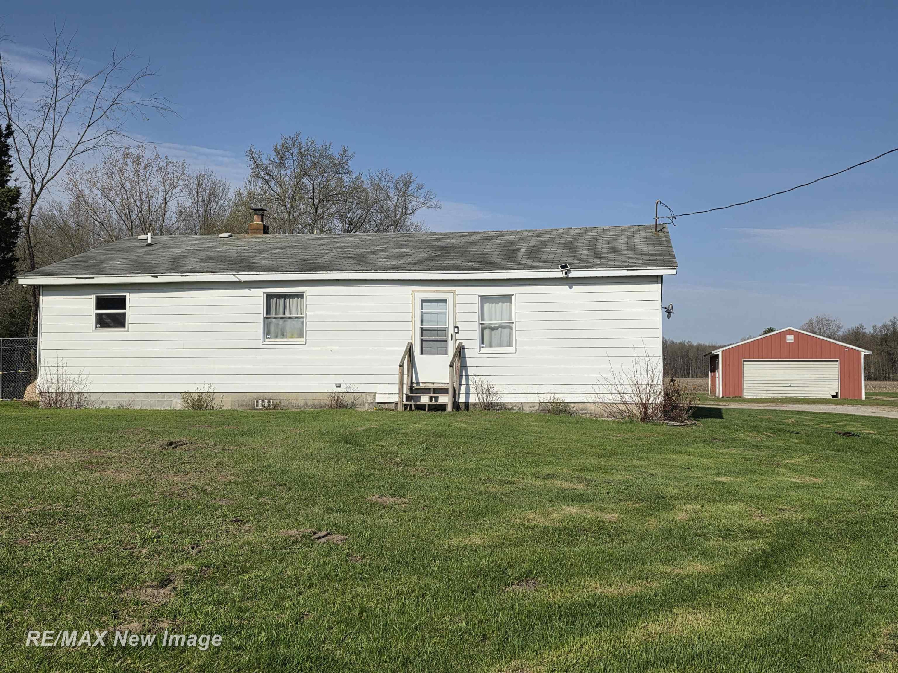 13740 S Merrill Road, Brant, MI 48614 — front exterior