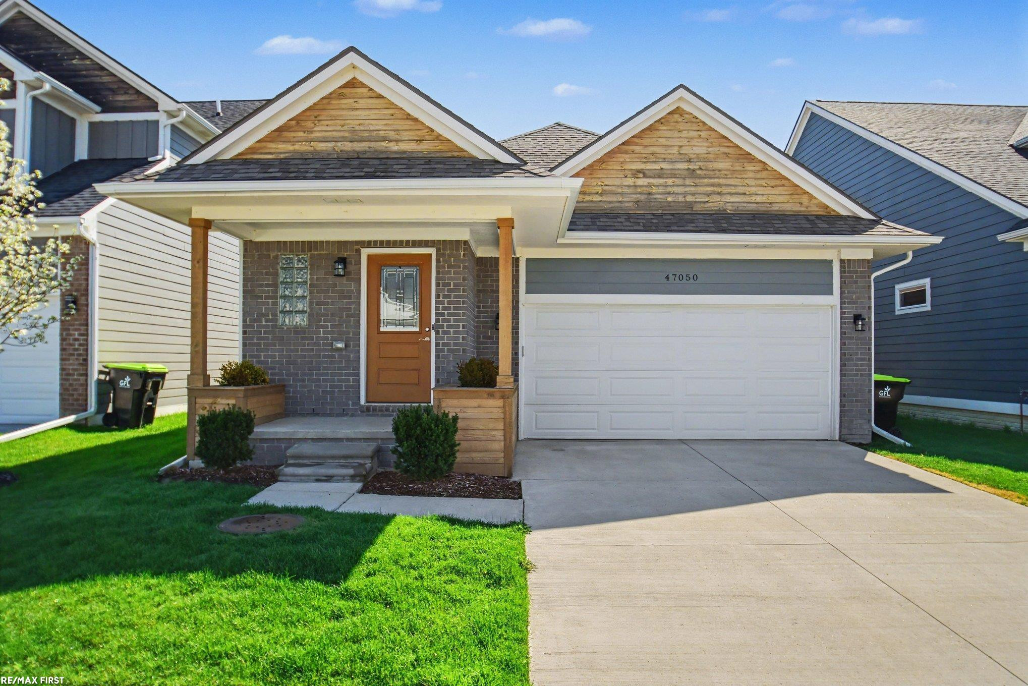 47050 Brookview Drive, MI 48047 — front exterior