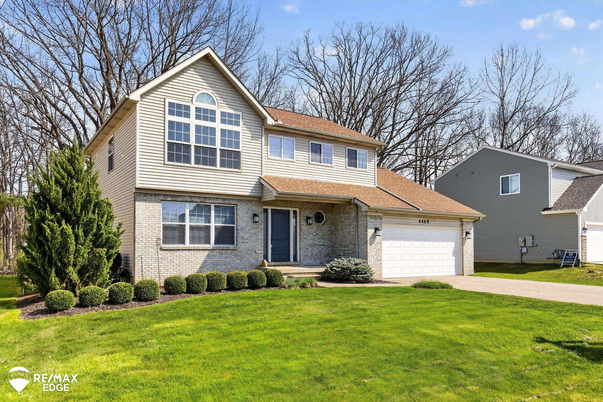 4469 Meadowlane Court, Burton, MI 48519 — front exterior