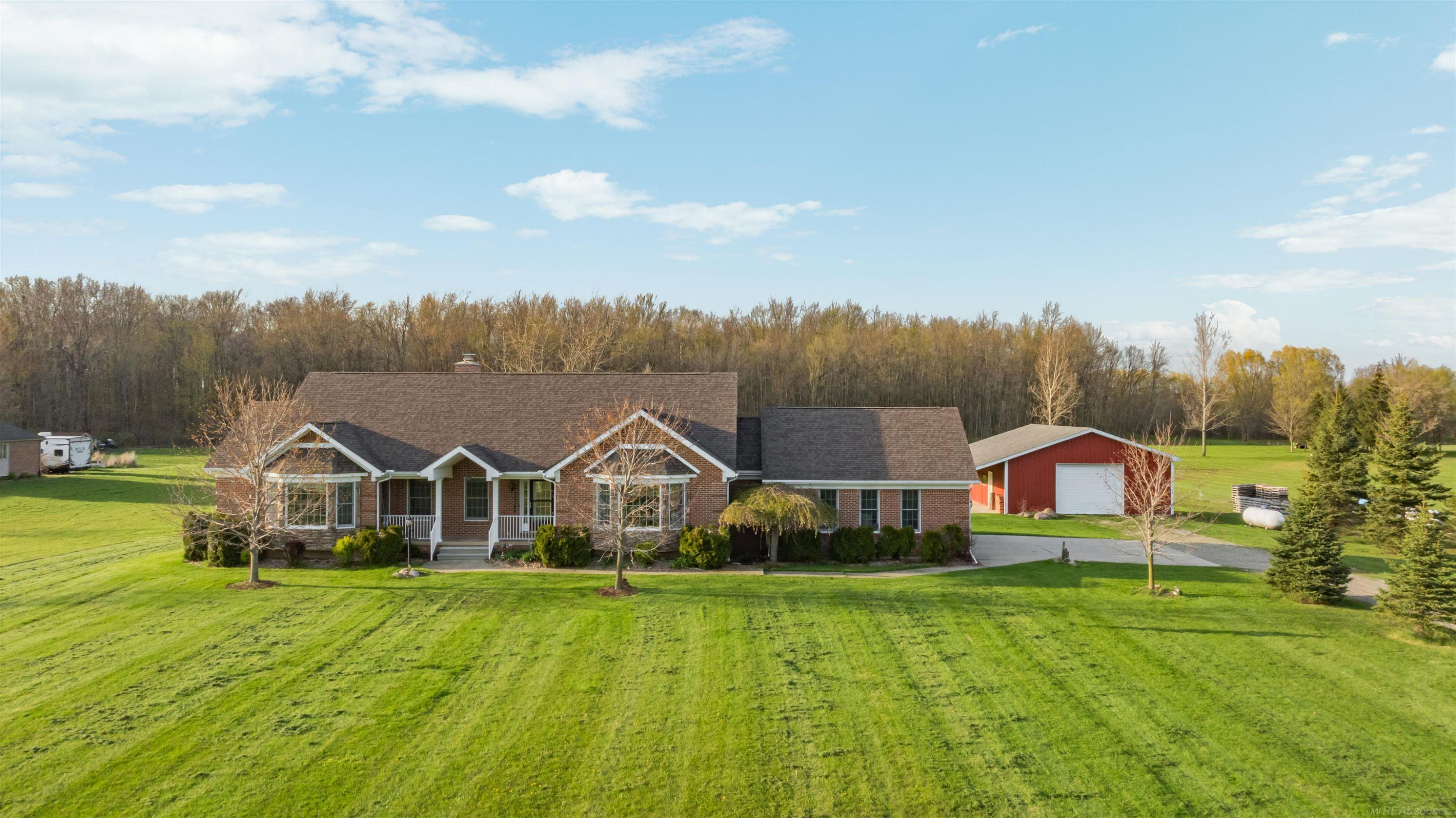 13148 Hunt Road, MI — front exterior