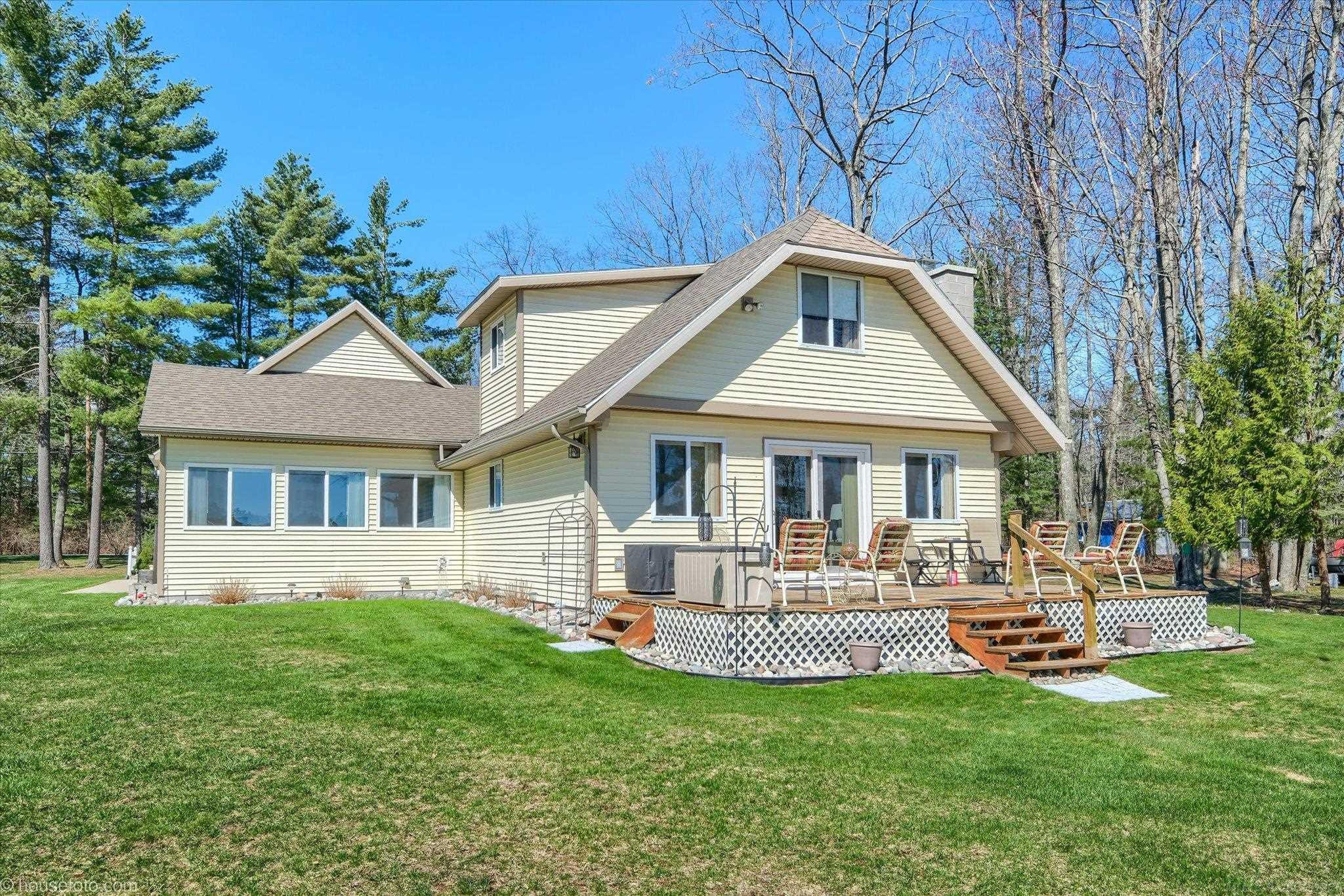 7414 Cedar Lake Road, Oscoda, MI 48750 — front exterior