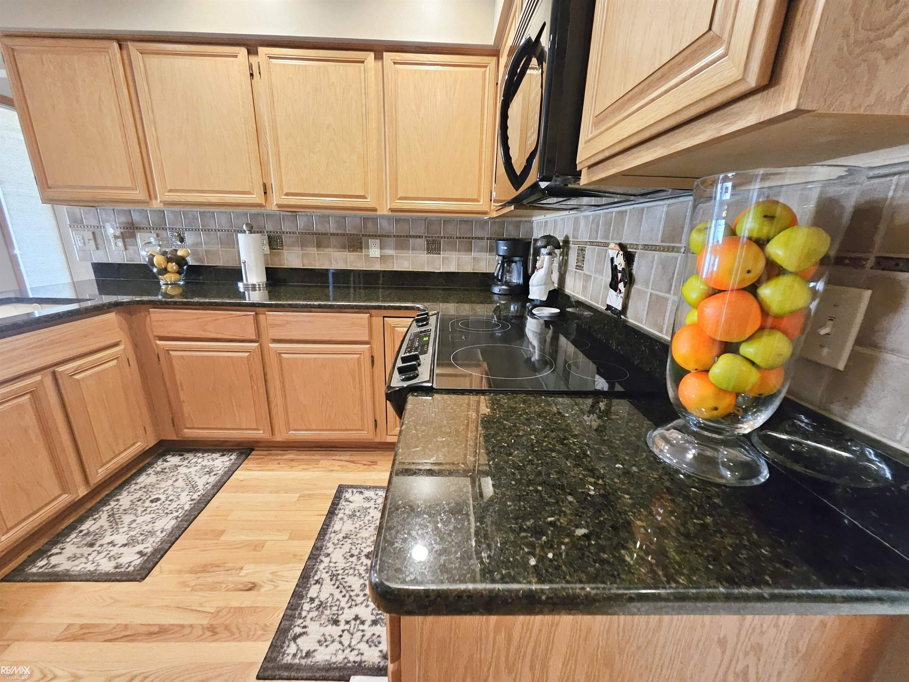 16890 SANDSTONE Circle, MI 48042 — Photo 16