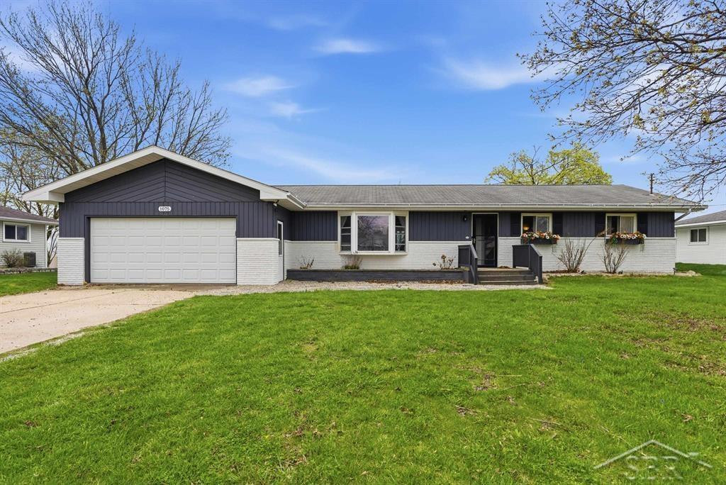 1075 Eddie Drive, Auburn, MI 48611 — front exterior