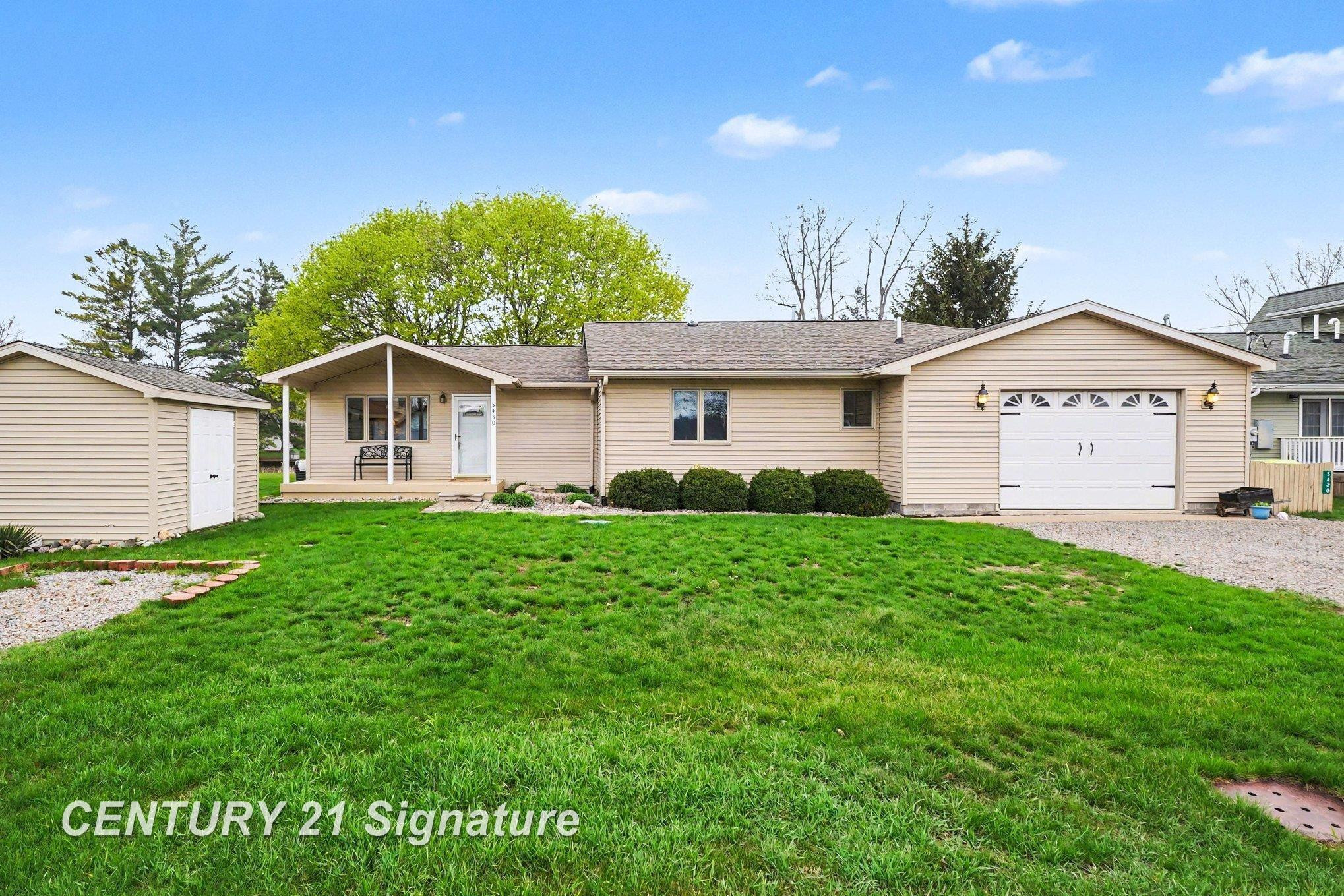 5430 S Pine Street, MI 48612 — front exterior