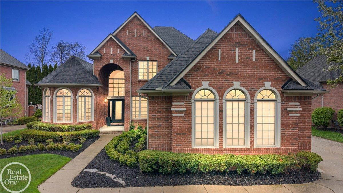 57409 Stonebriar Drive, MI — front exterior