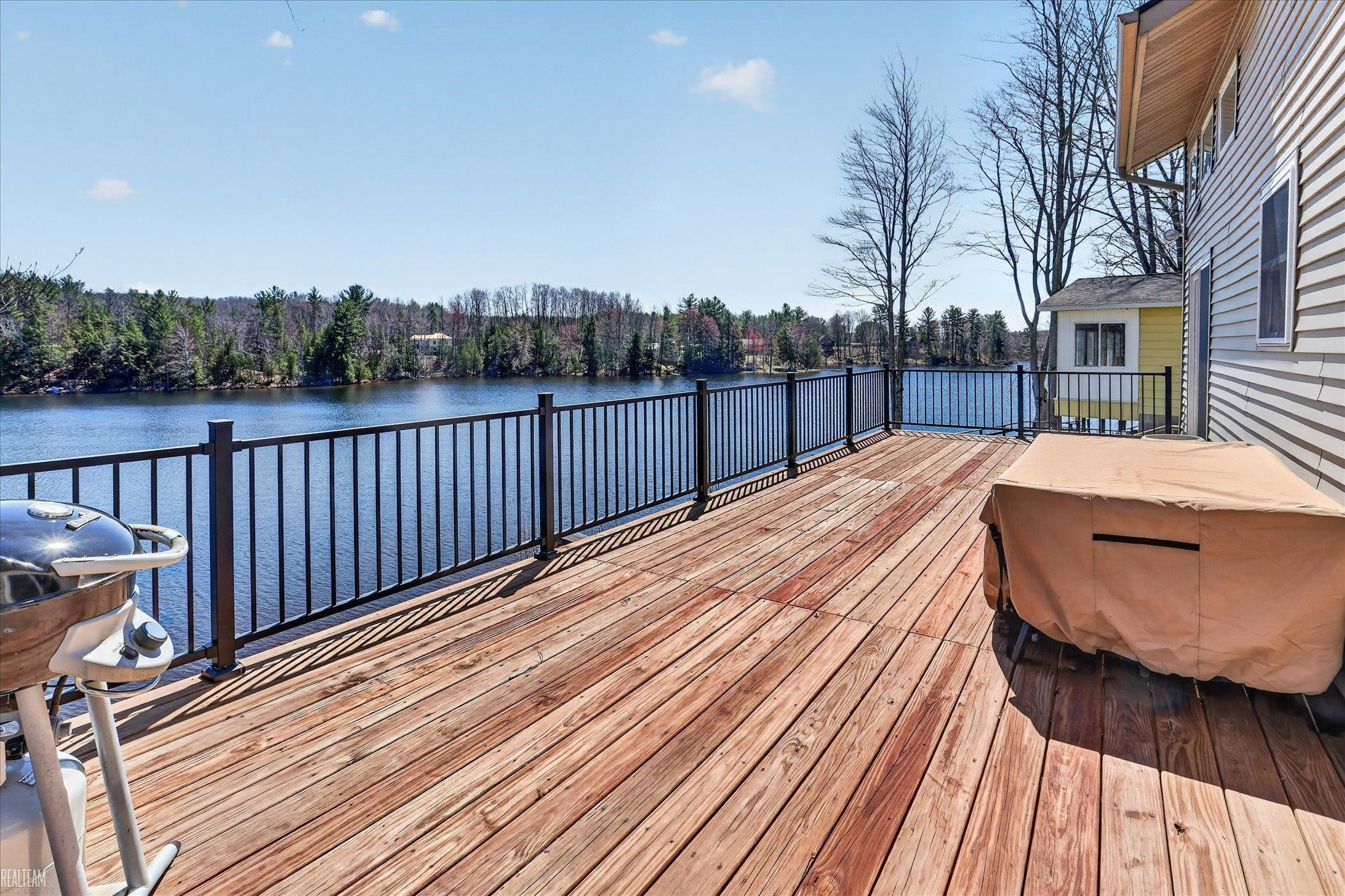 6258 SW Ginafred Shores Drive, Fife Lake, MI 49633 — Photo 28