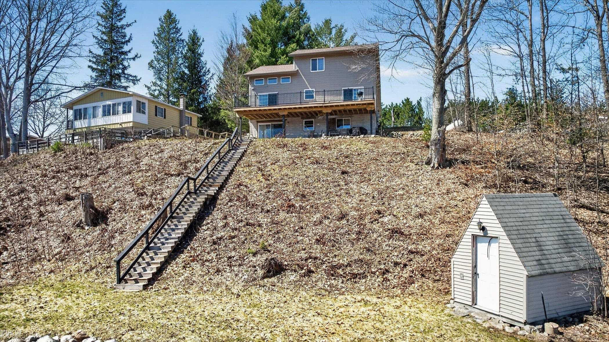 6258 SW Ginafred Shores Drive, Fife Lake, MI 49633 — Photo 31
