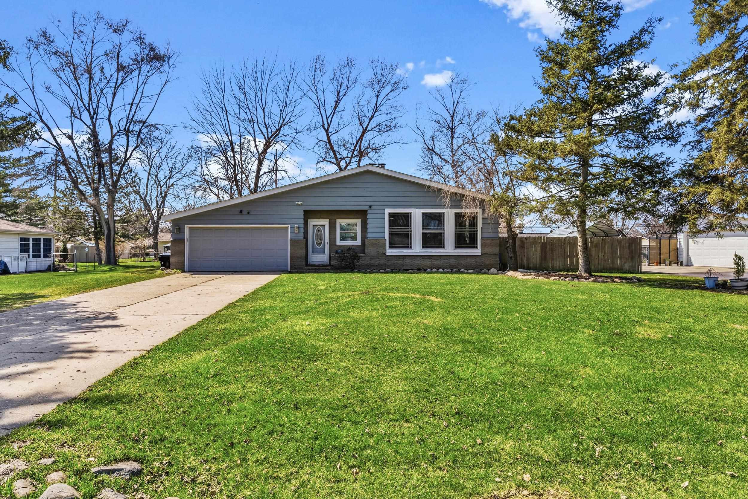 2125 Thistlewood Drive, Burton, MI 48509 — front exterior