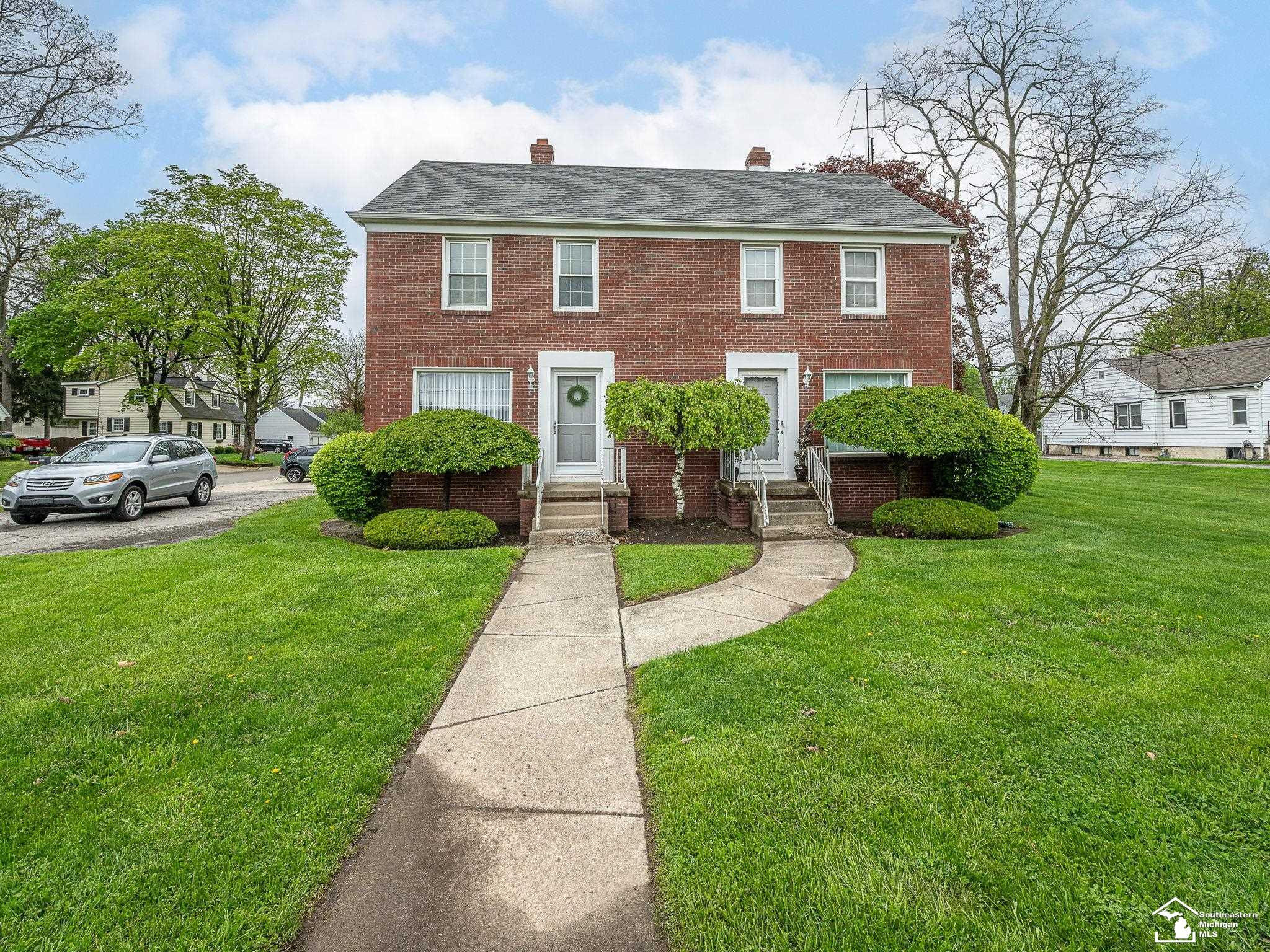 1049/1057 N Monroe Street, Monroe, MI 48162 — front exterior