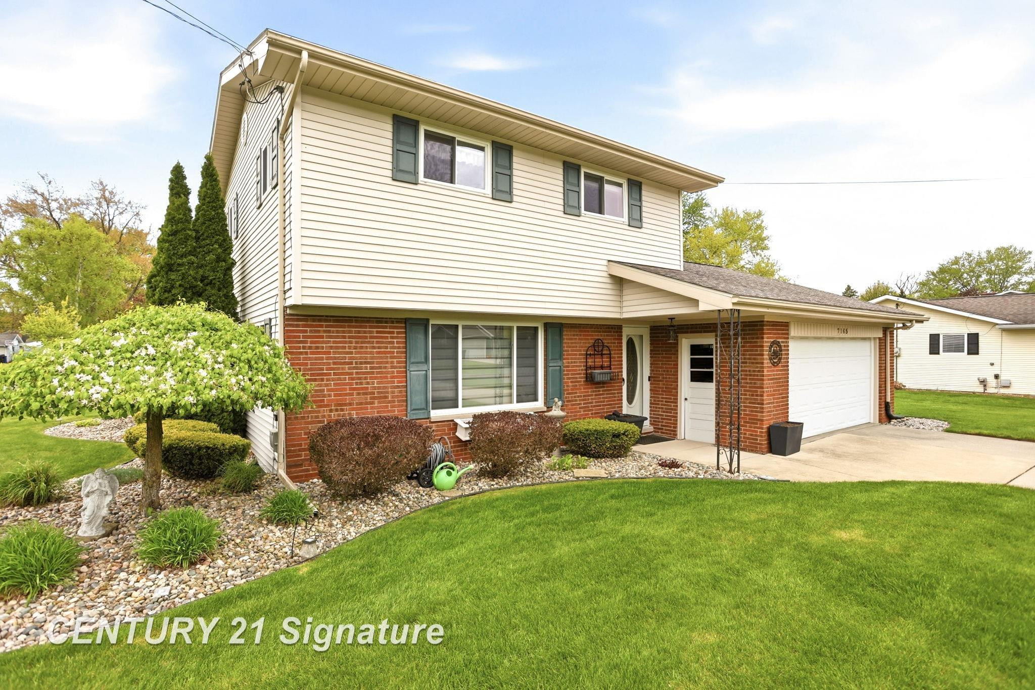 7165 Burmeister Drive, Saginaw, MI 48609 — front exterior