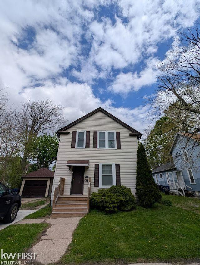 609 Thomson Street, Flint, MI 48503 — front exterior