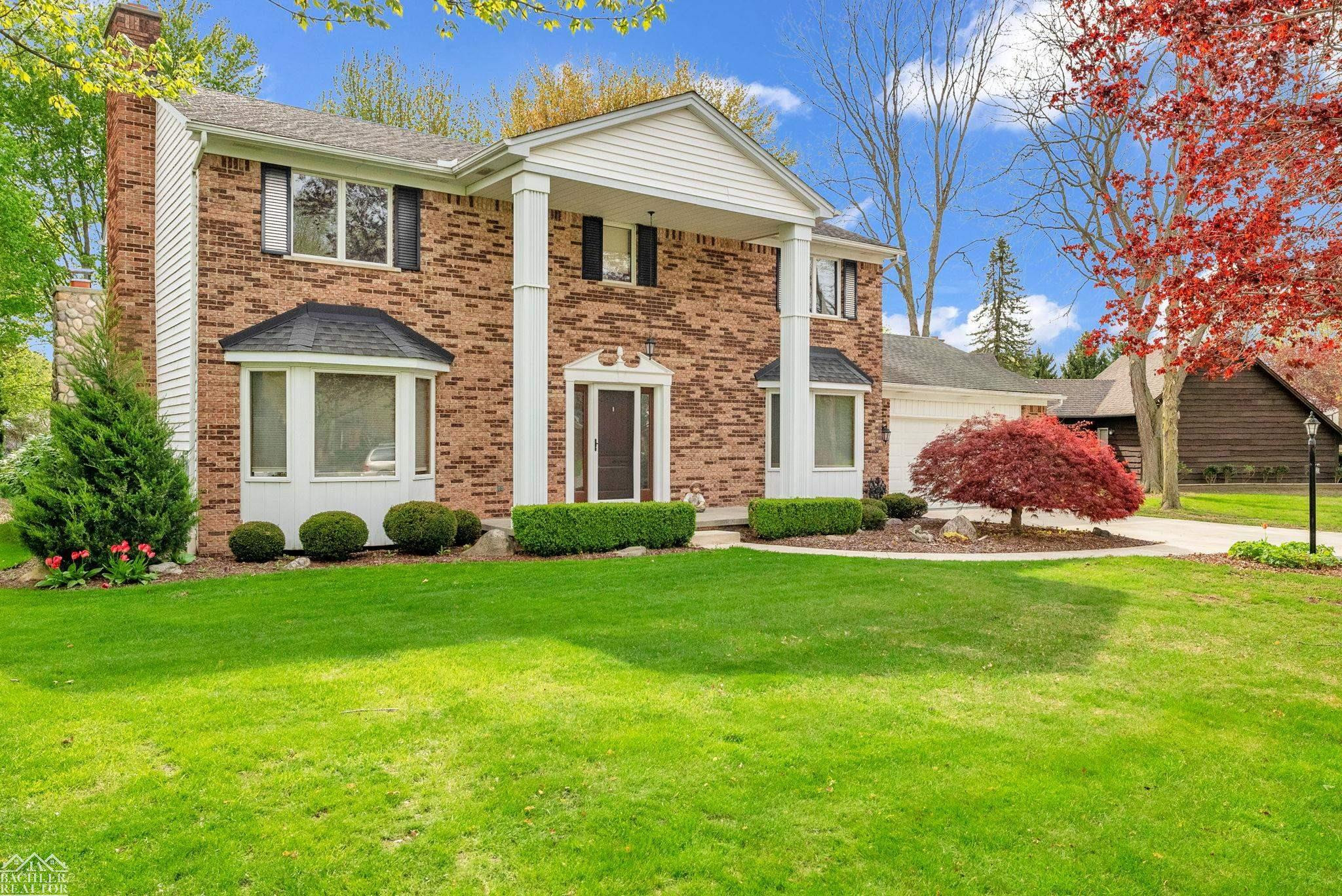5409 Vista Belle Court, MI — front exterior