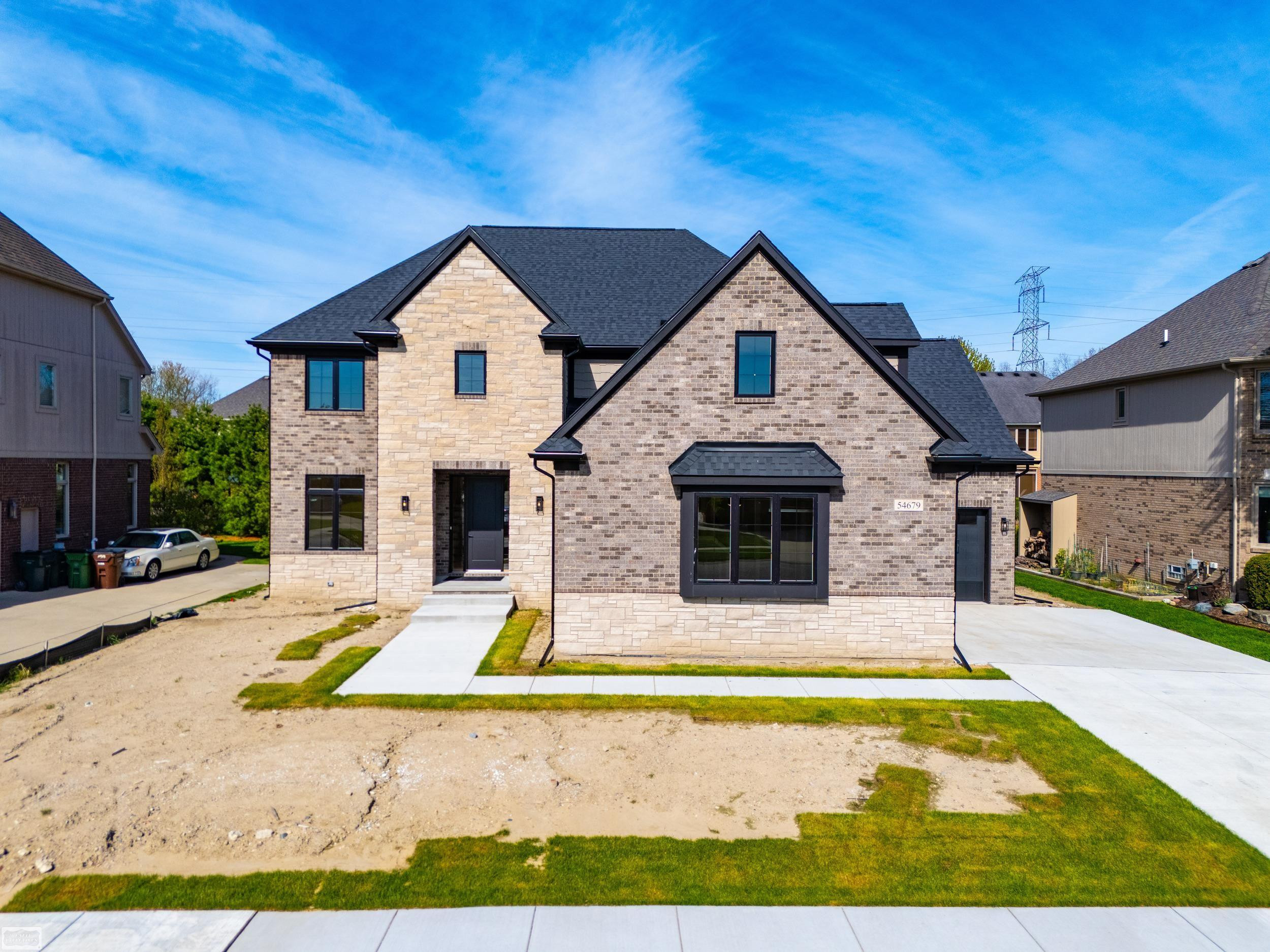 54679 White Pine Lane, Shelby Twp, MI 48315 — front exterior