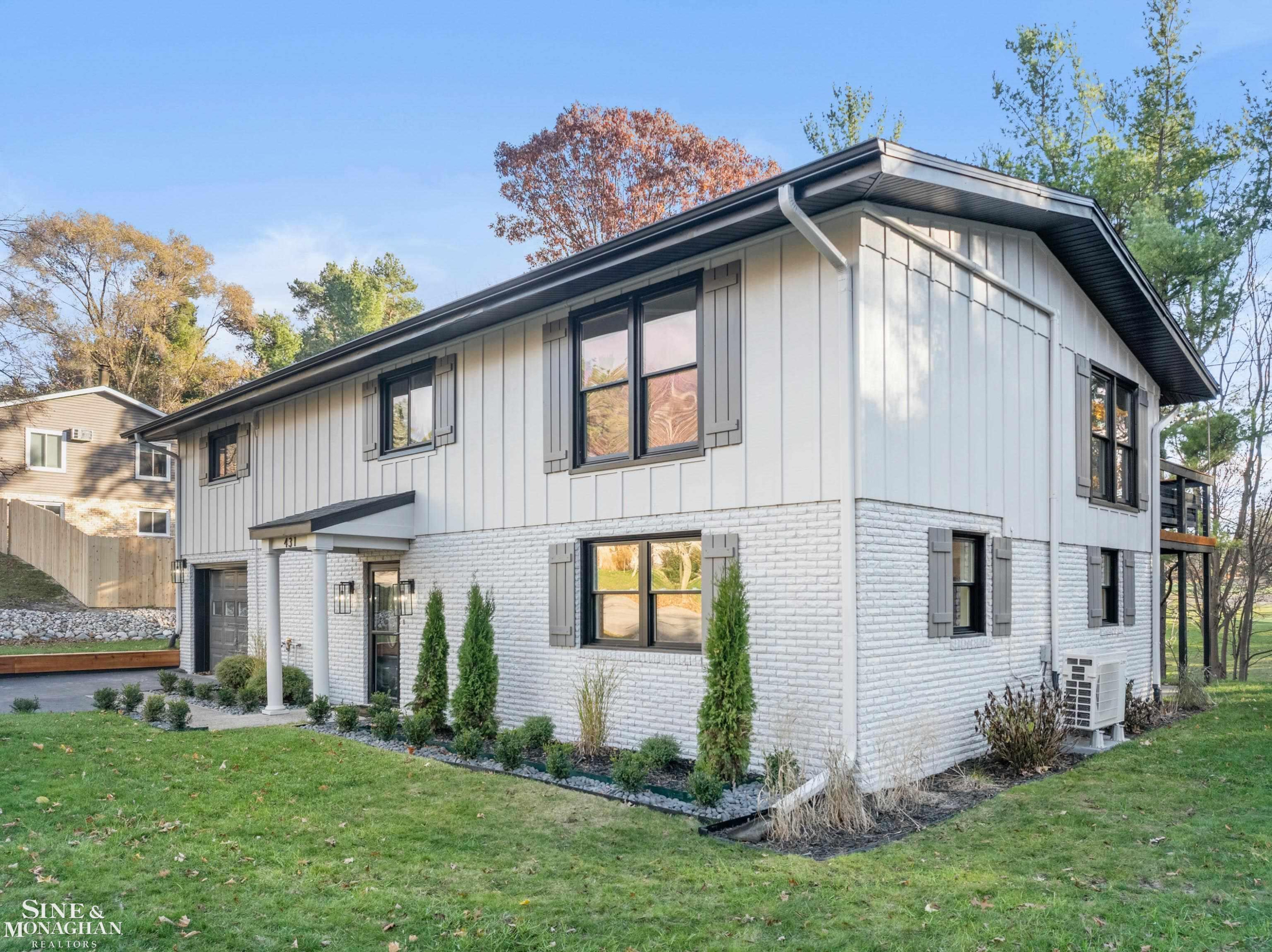 431 Fairlane Drive, Traverse City, MI 49684 — front exterior