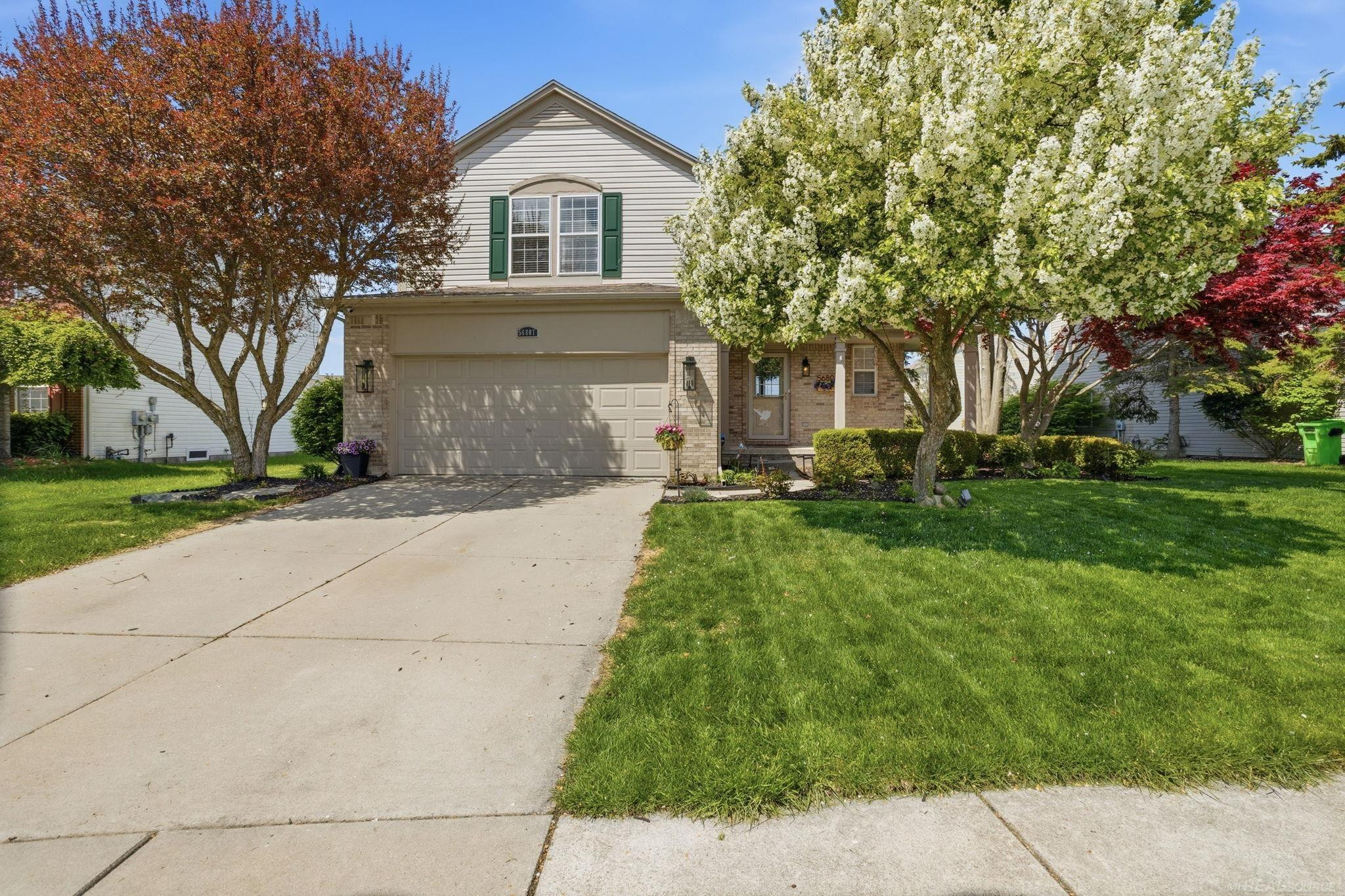56807 Winding Creek Drive, Macomb, MI 48042 — front exterior