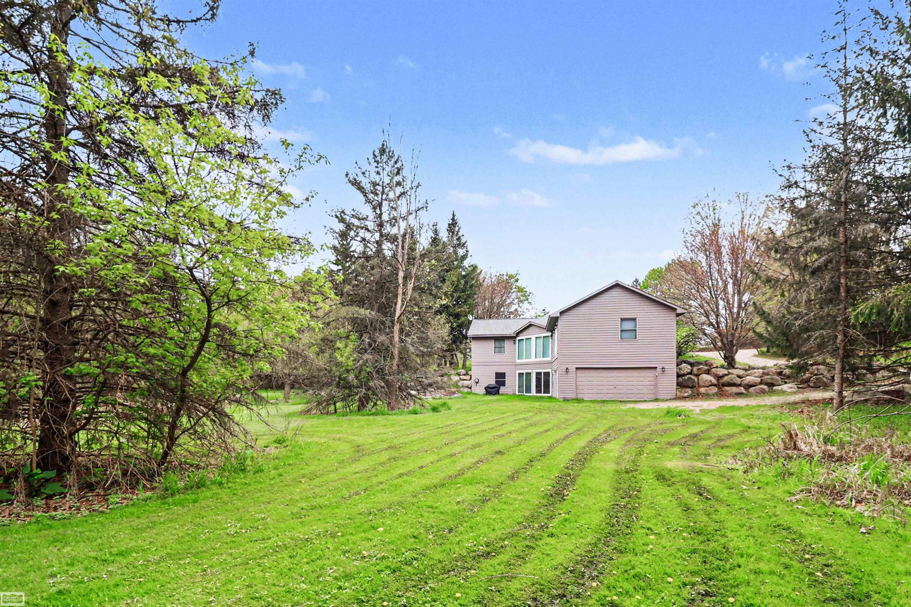 8978 Hidden Lake Drive, Howell, MI 48855 — Photo 25