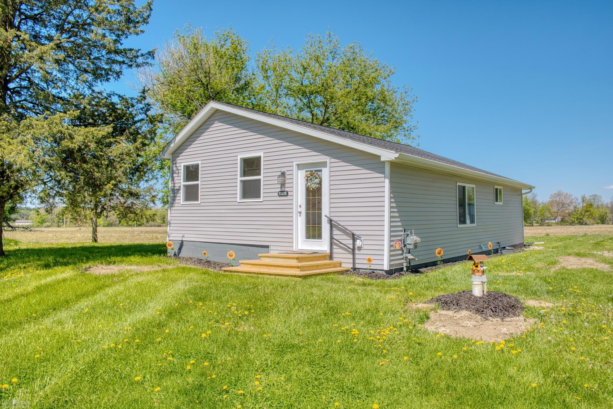11695 E Lytle Road, MI 48449 — front exterior