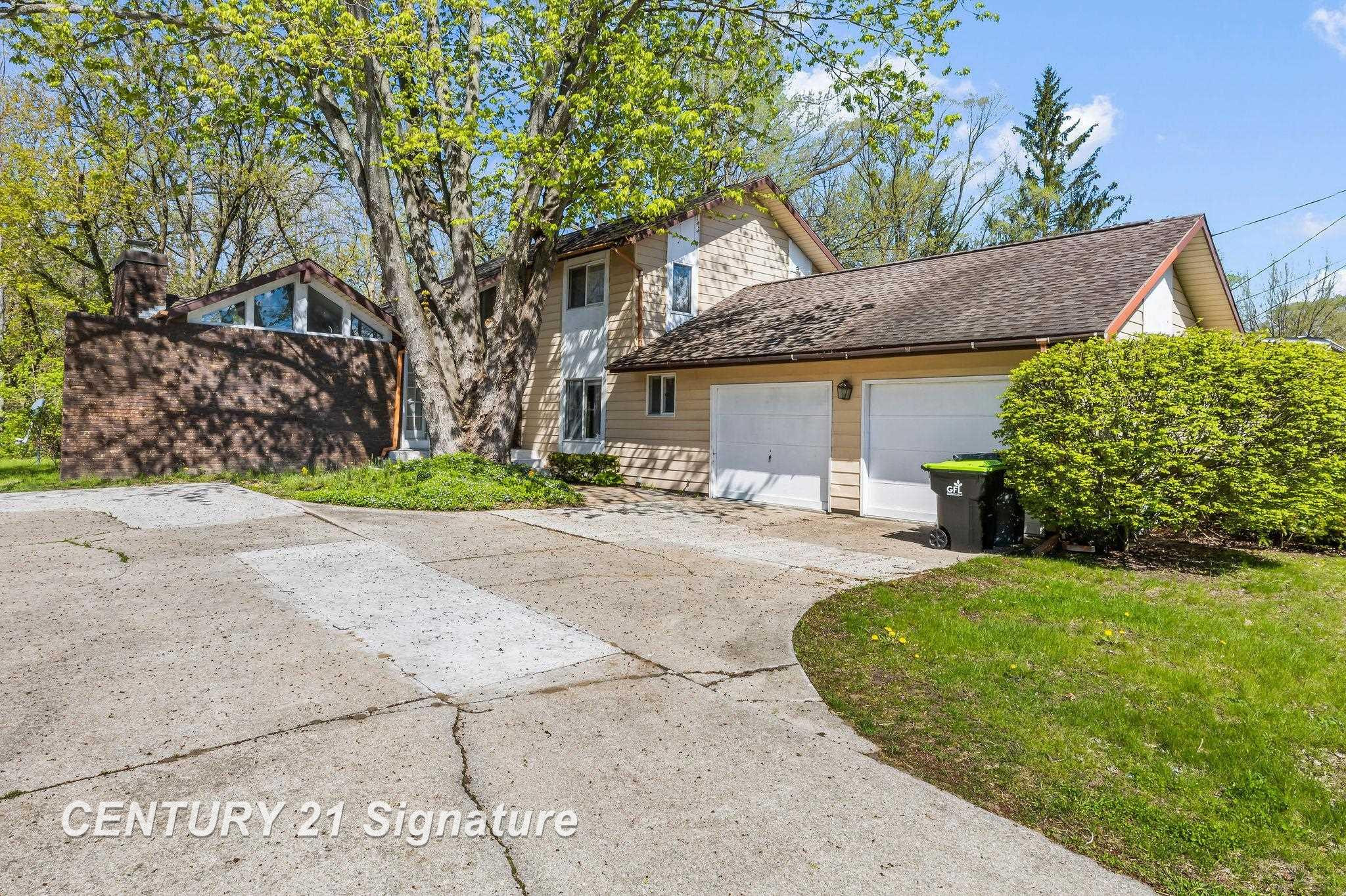 5813 Sturgeon Avenue, Midland, MI 48640 — front exterior