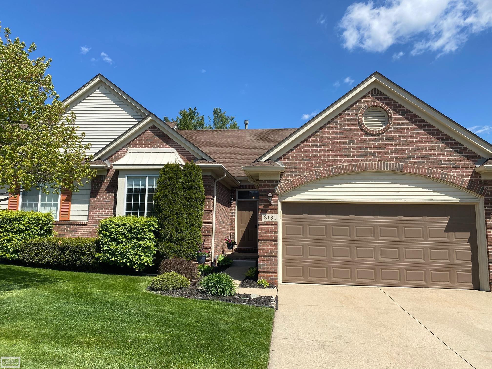8131 Huntington Ridge Court, Washington, MI — front exterior