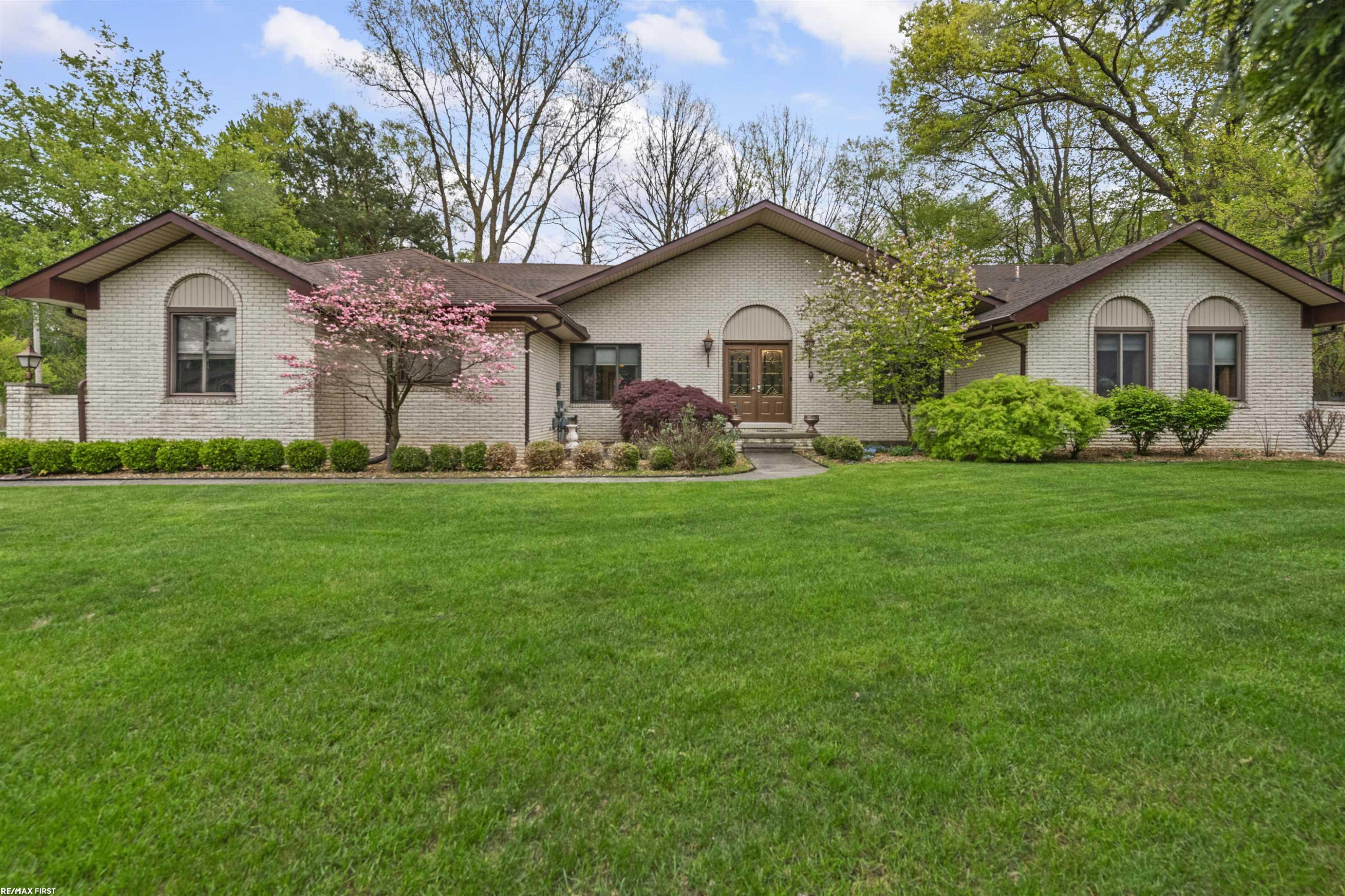 6910 Montgomery Drive, Shelby Twp, MI 48316 — front exterior