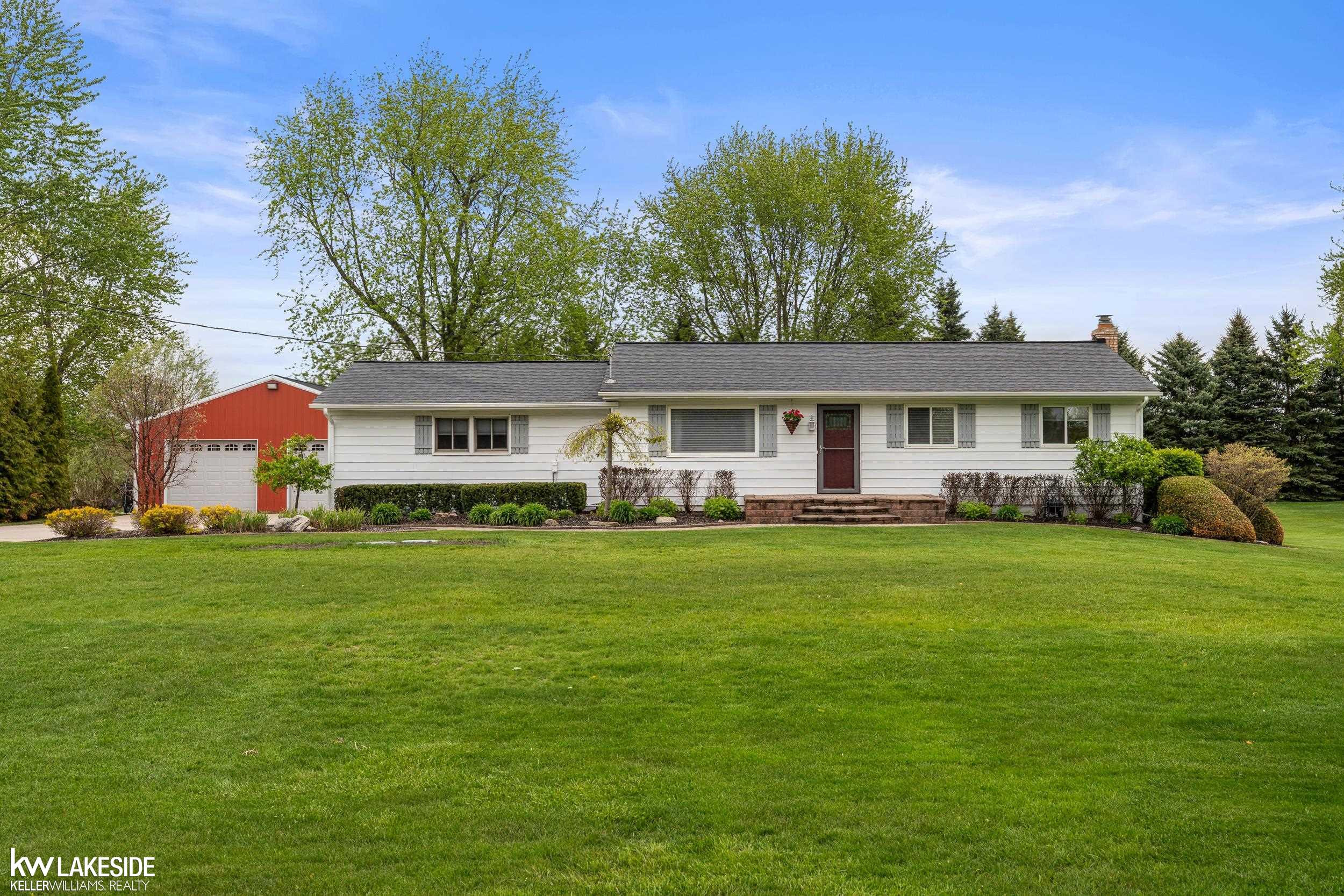 77230 Coon Creek Road, MI — front exterior
