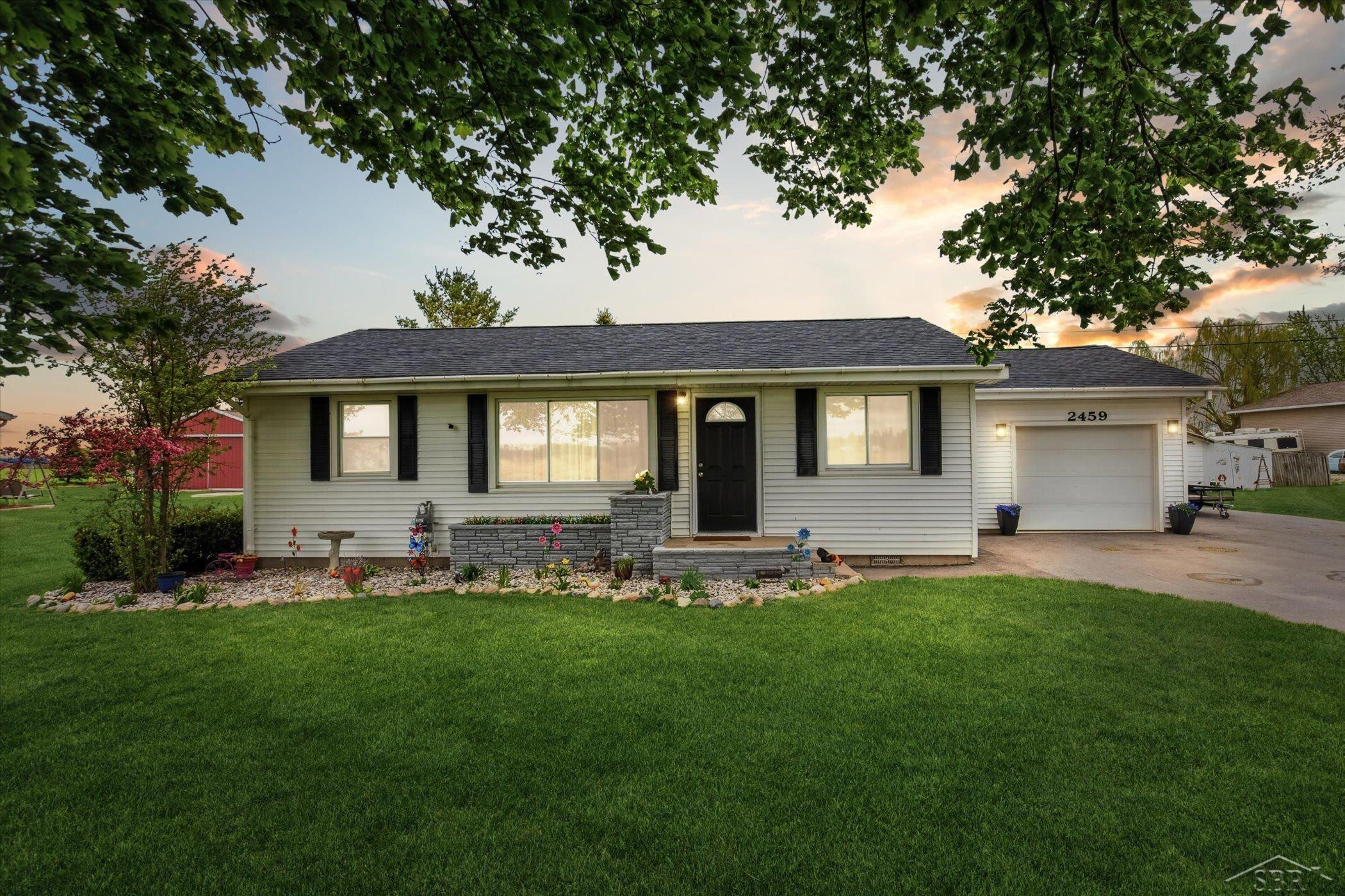 2459 11 Mile Road, Auburn, MI 48611 — front exterior