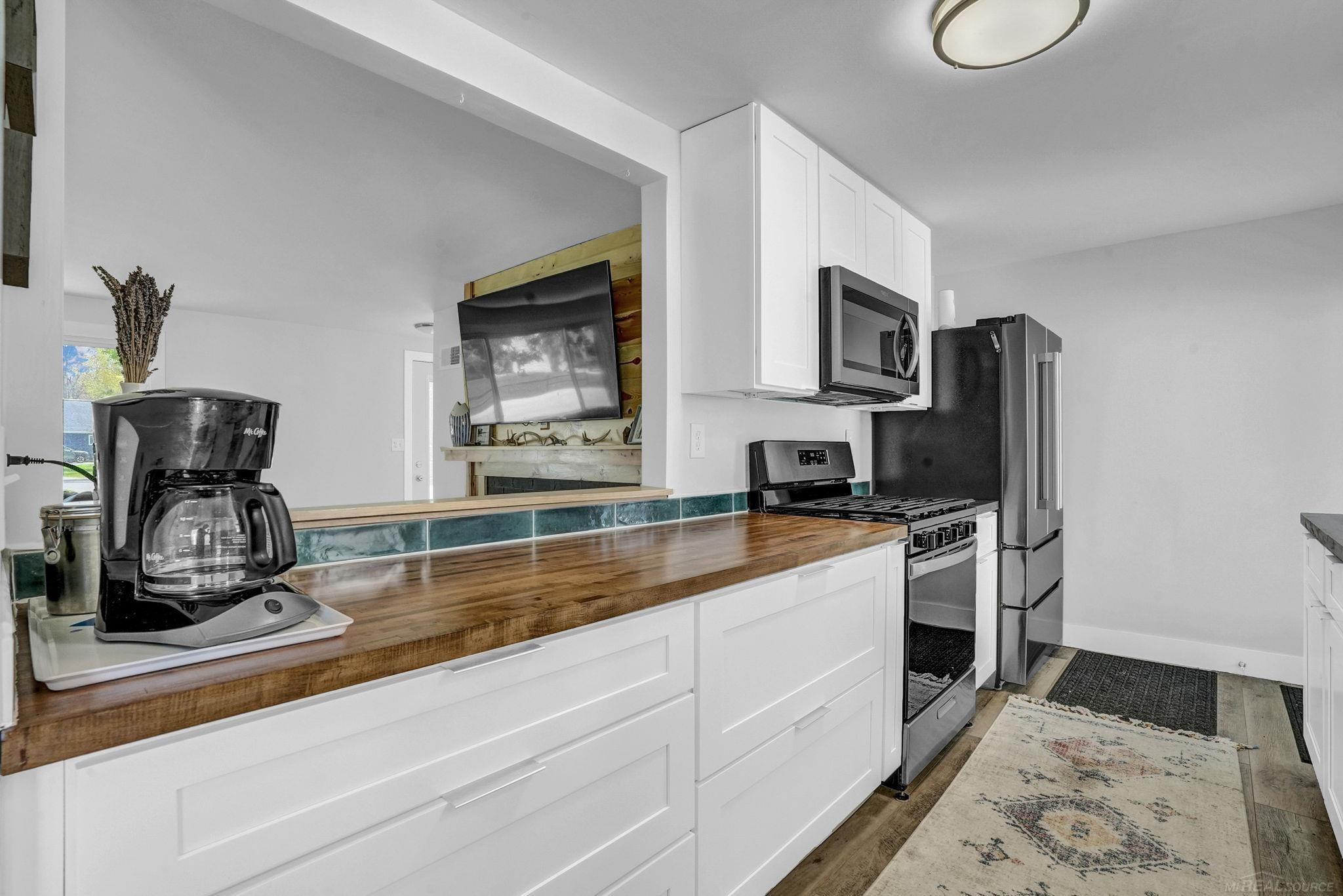 306 Festival Avenue, Houghton Lake, MI 48629 — Photo 24