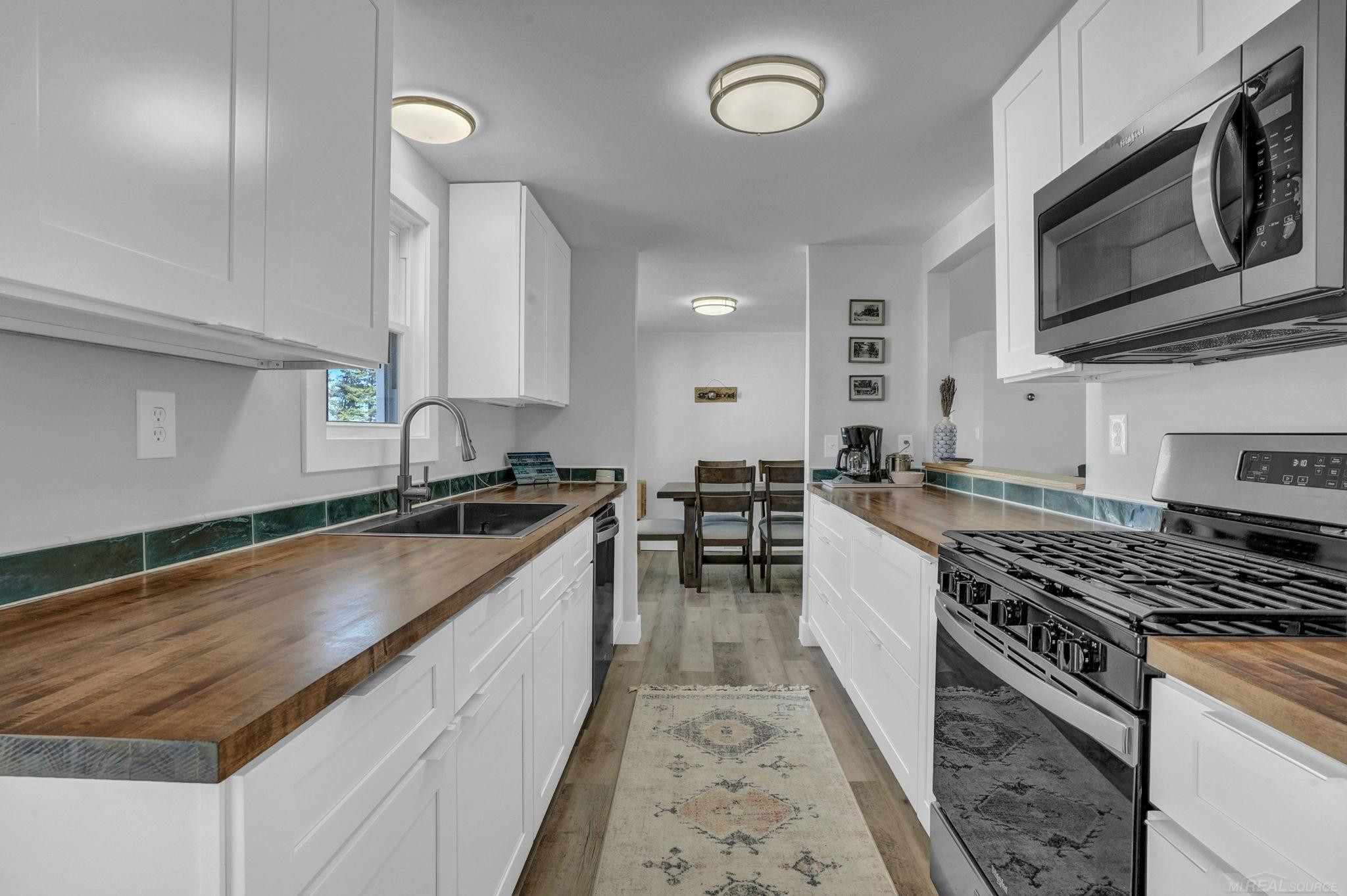 306 Festival Avenue, Houghton Lake, MI 48629 — Photo 30