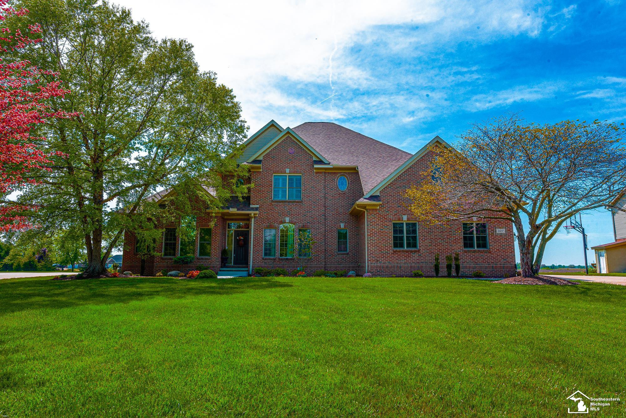 327 Pebble Beach Drive, Monroe, MI 48162 — front exterior