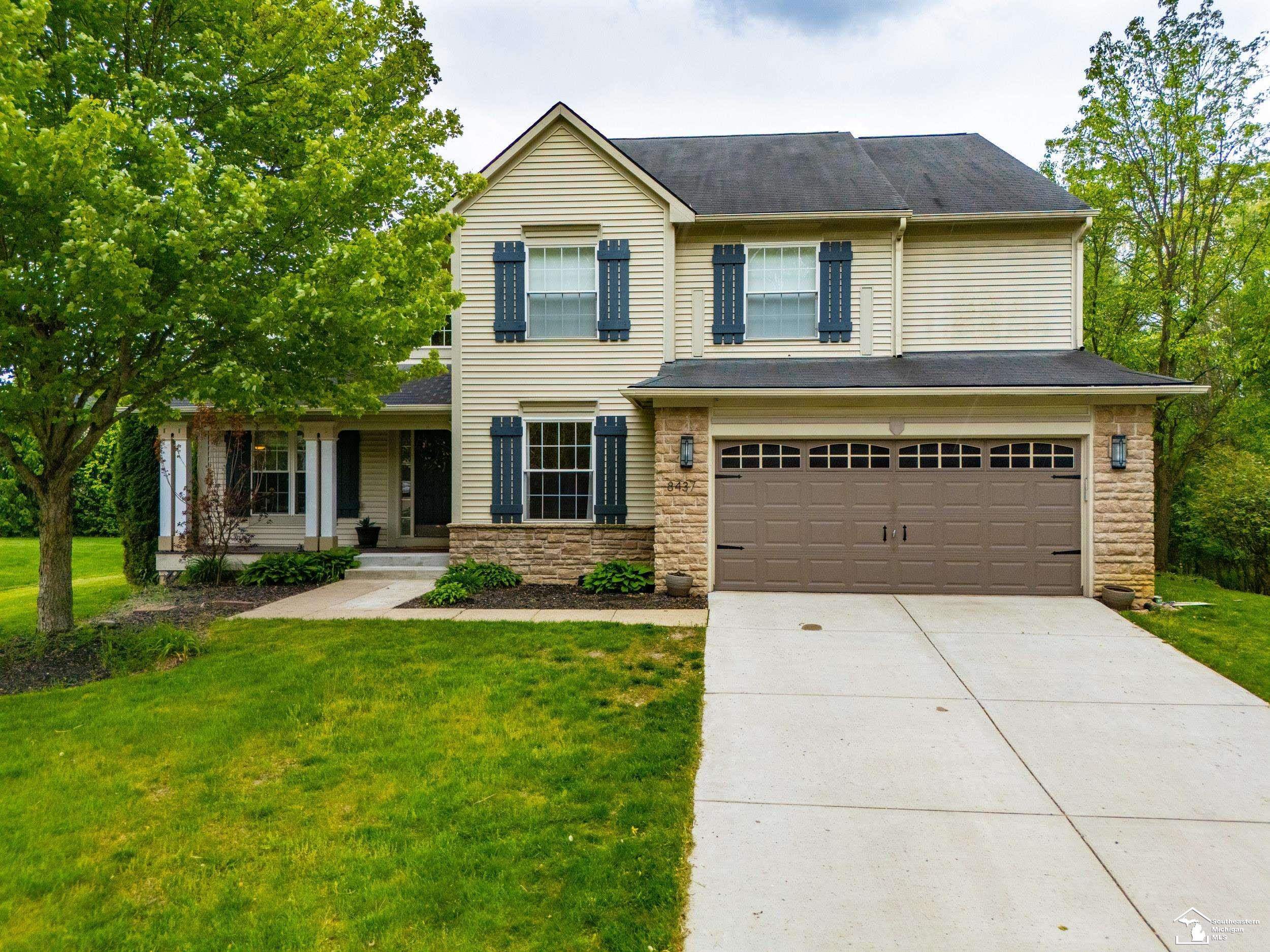 8437 Parkridge Drive, Dexter, MI 48130 — front exterior