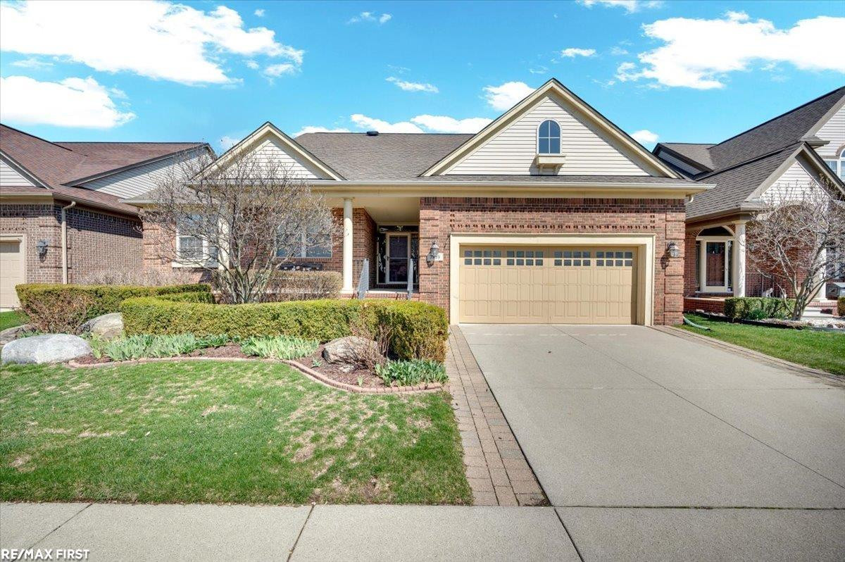 7969 Stableford Drive, Washington, MI — front exterior