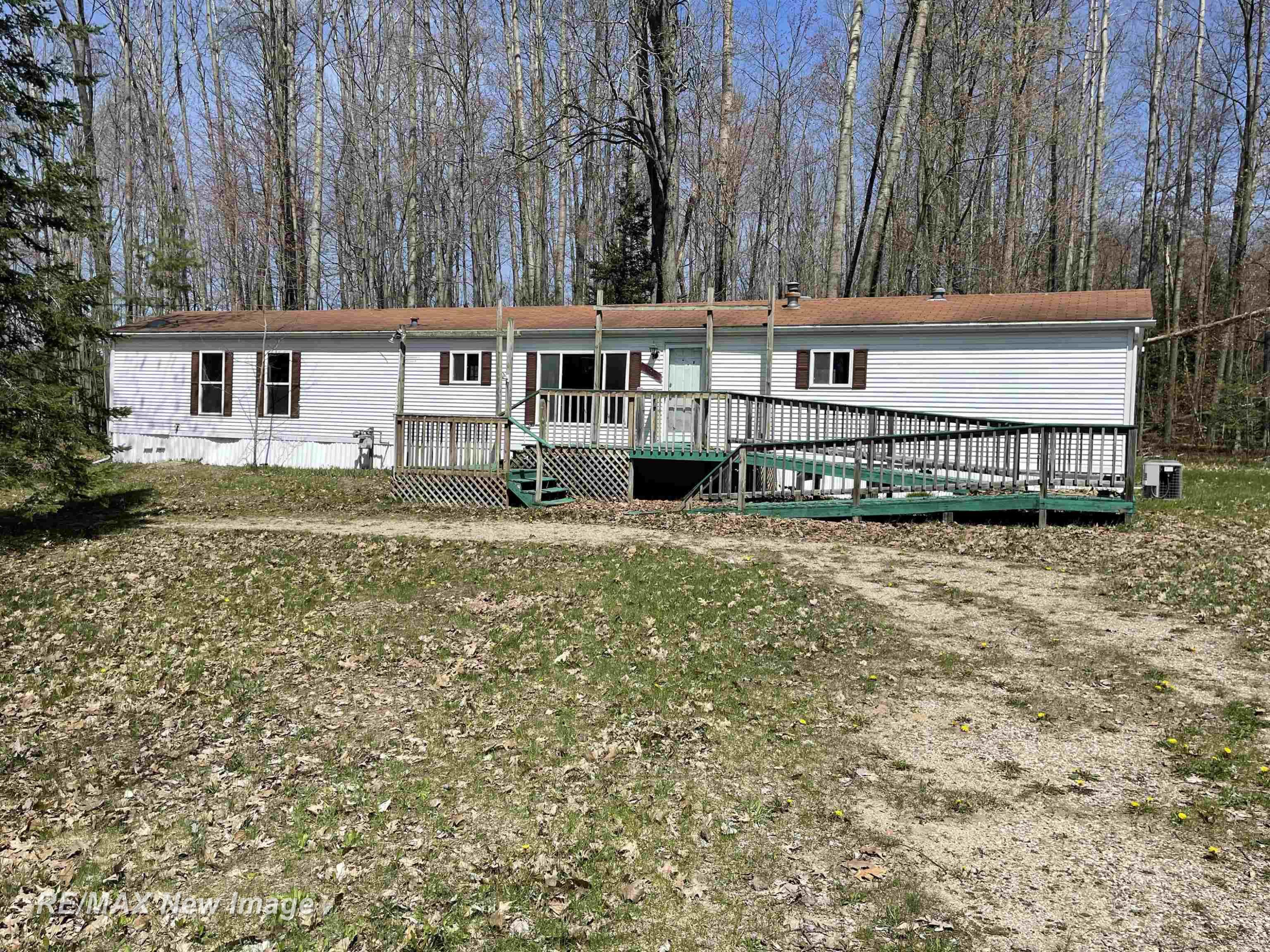 7100 Spring Lake Avenue, Lake, MI 48632 — front exterior