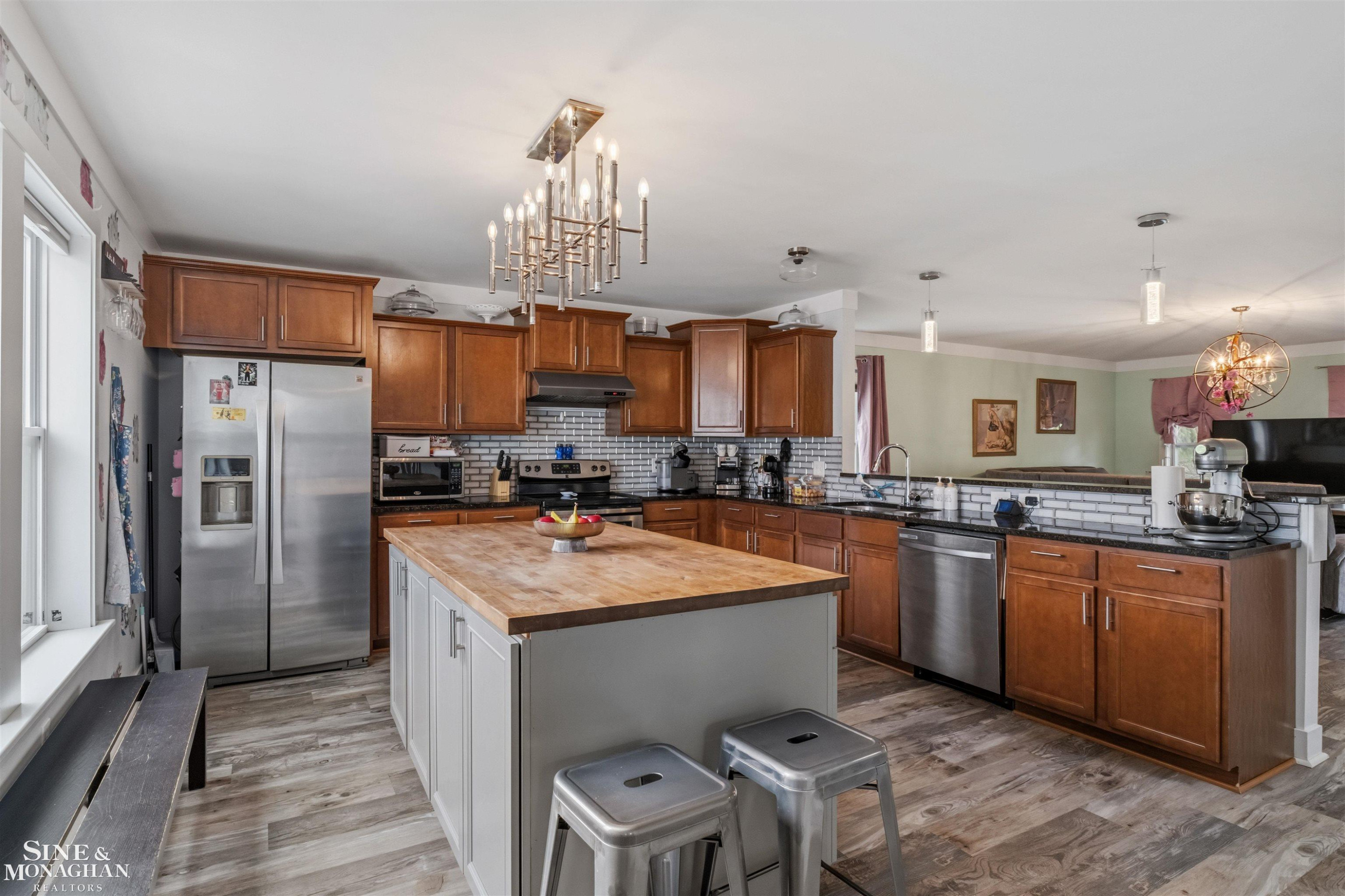 170 Merrimack Drive, Howell, MI 48843 — Photo 15