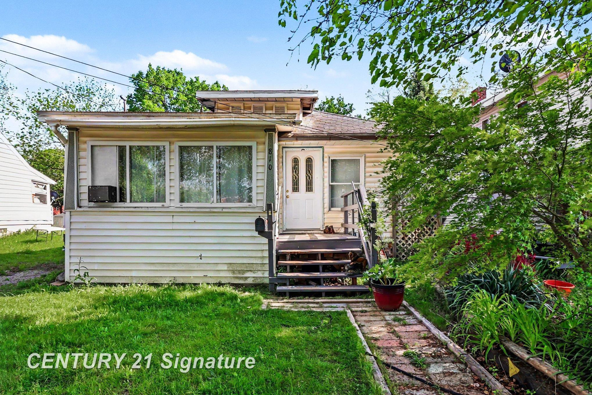 810 McKinley Street, Lansing, MI 48906 — front exterior