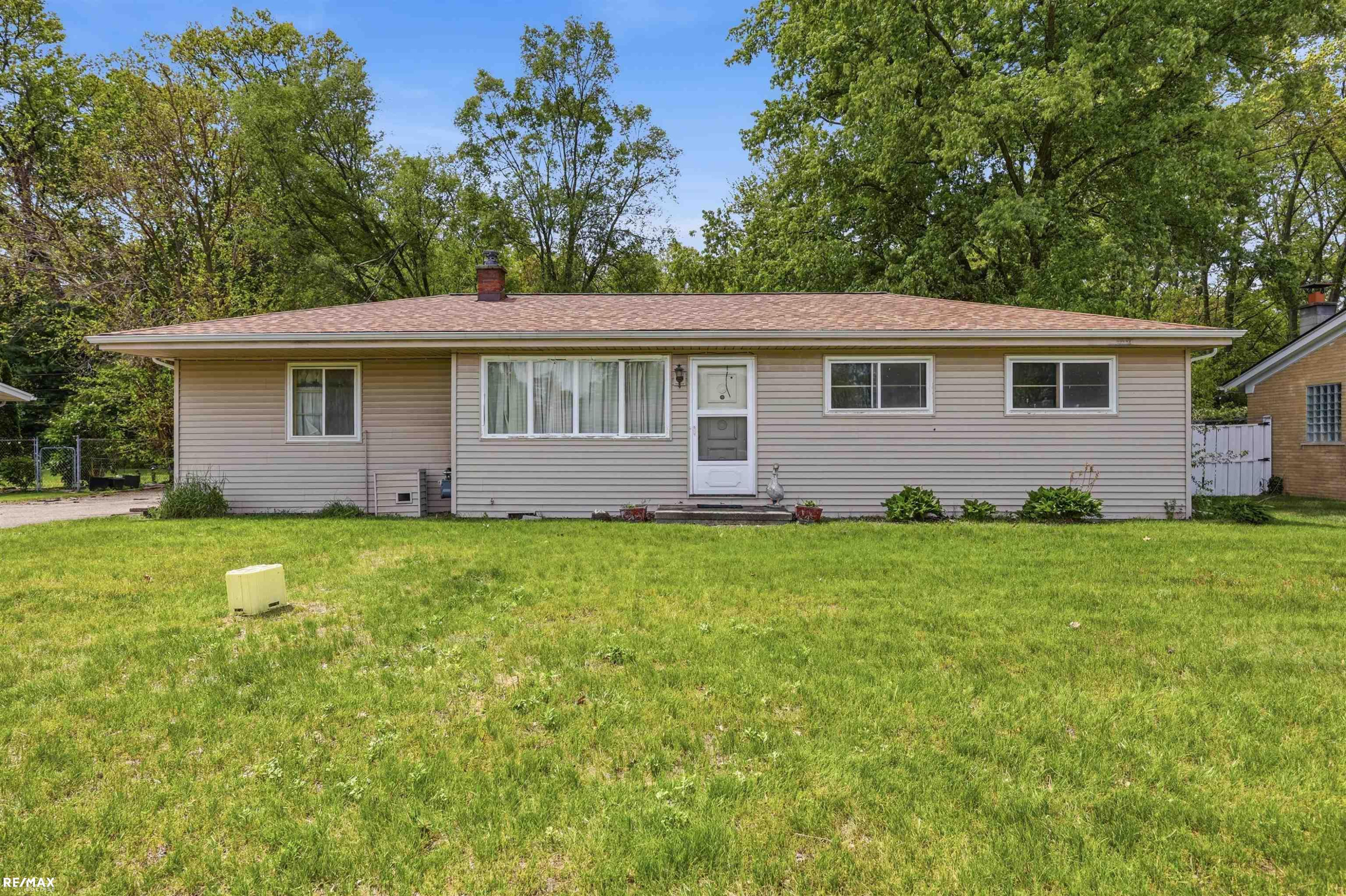 52647 Brentwood Drive, Shelby Twp, MI 48316 — front exterior