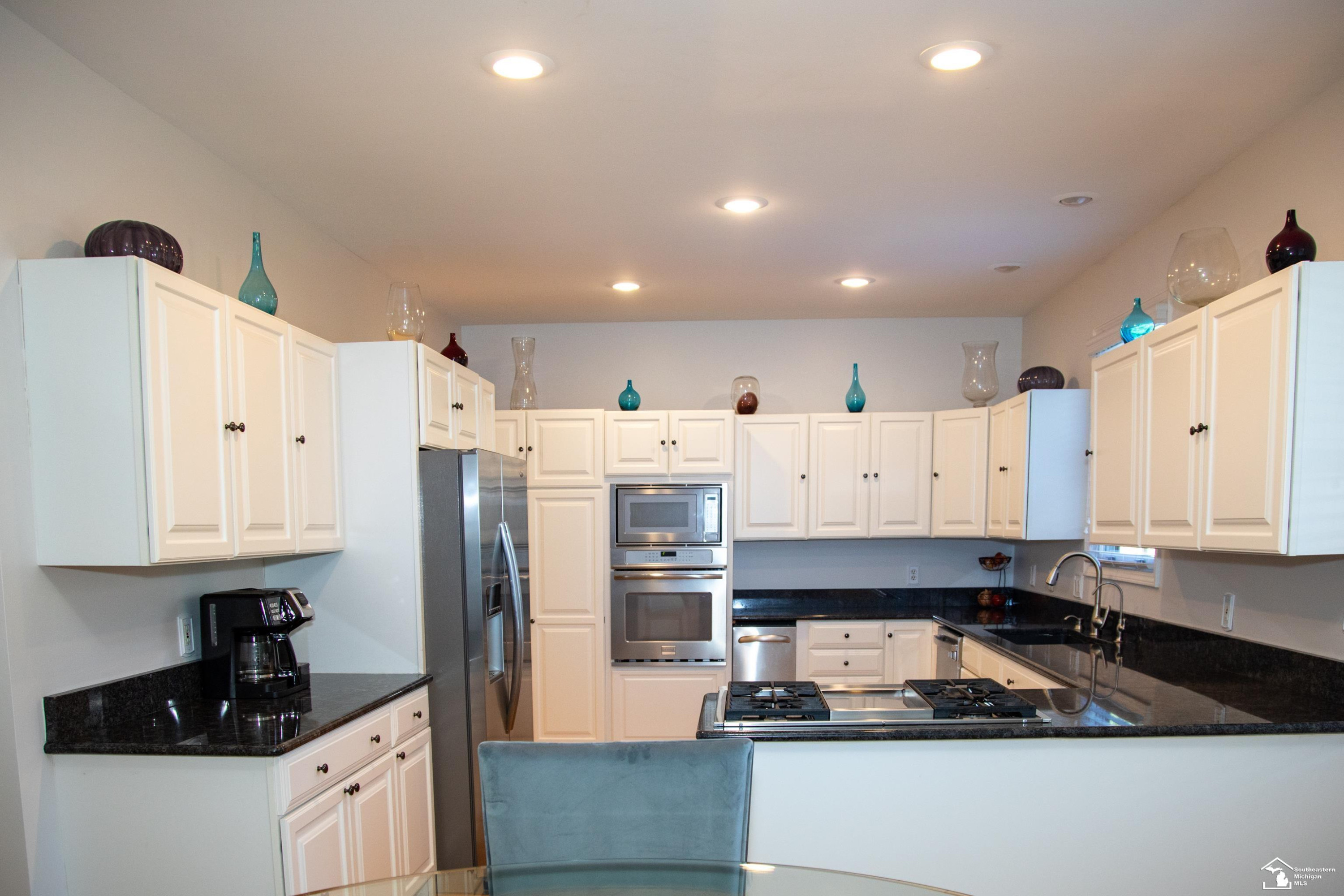 52881 Rico Court, Wixom, MI 48393 — Photo 13