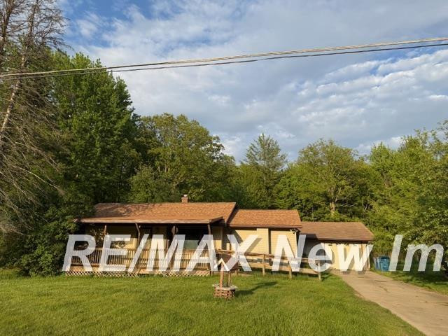 803 S Woodcock Road, Midland, MI 48640 — front exterior