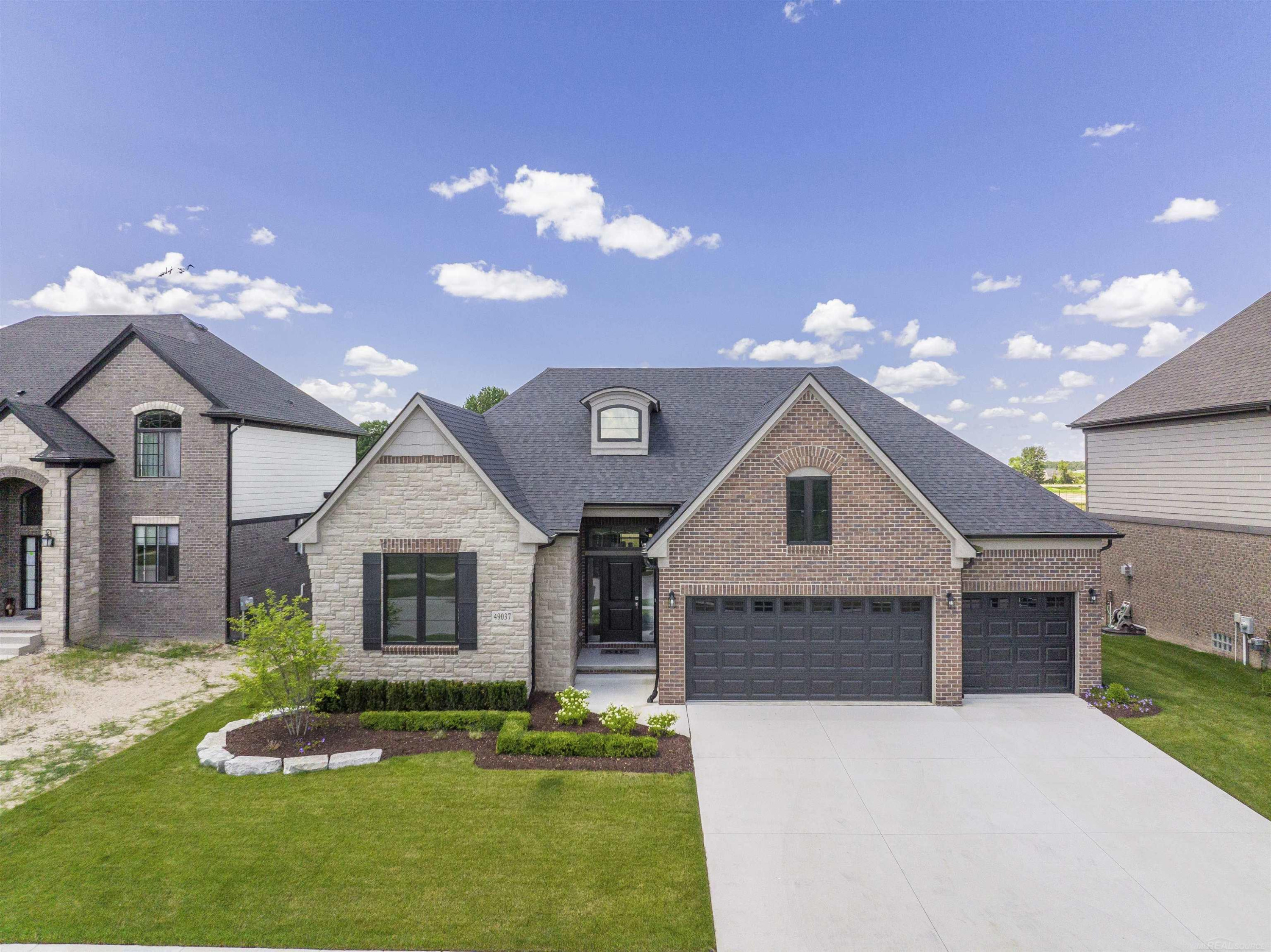 49195 Langford Drive, 216, Macomb, MI 48044 — front exterior