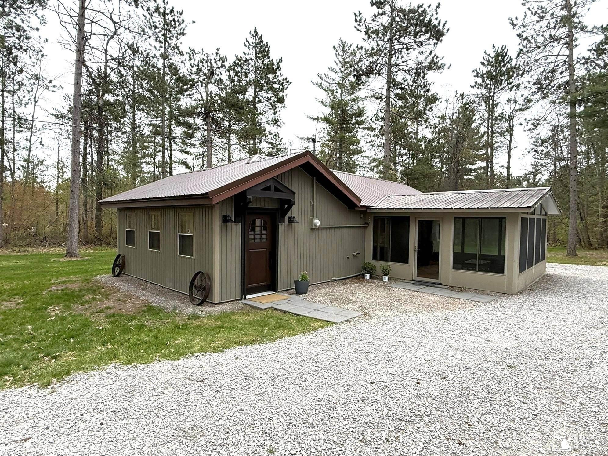 1391 W Hill Road, Lewiston, MI 49756 — front exterior