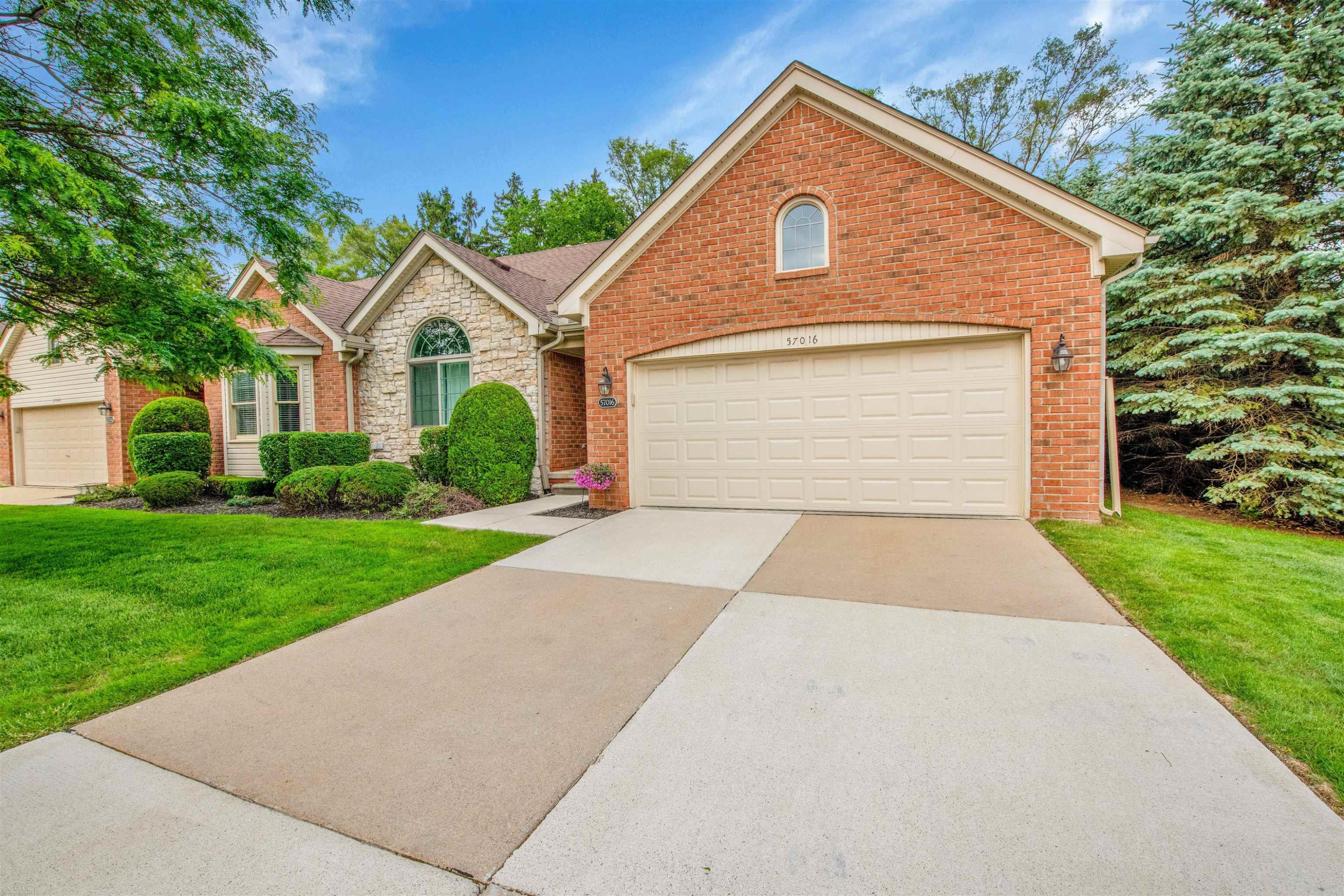 57016 Megan Dr Drive, Washington, MI — front exterior